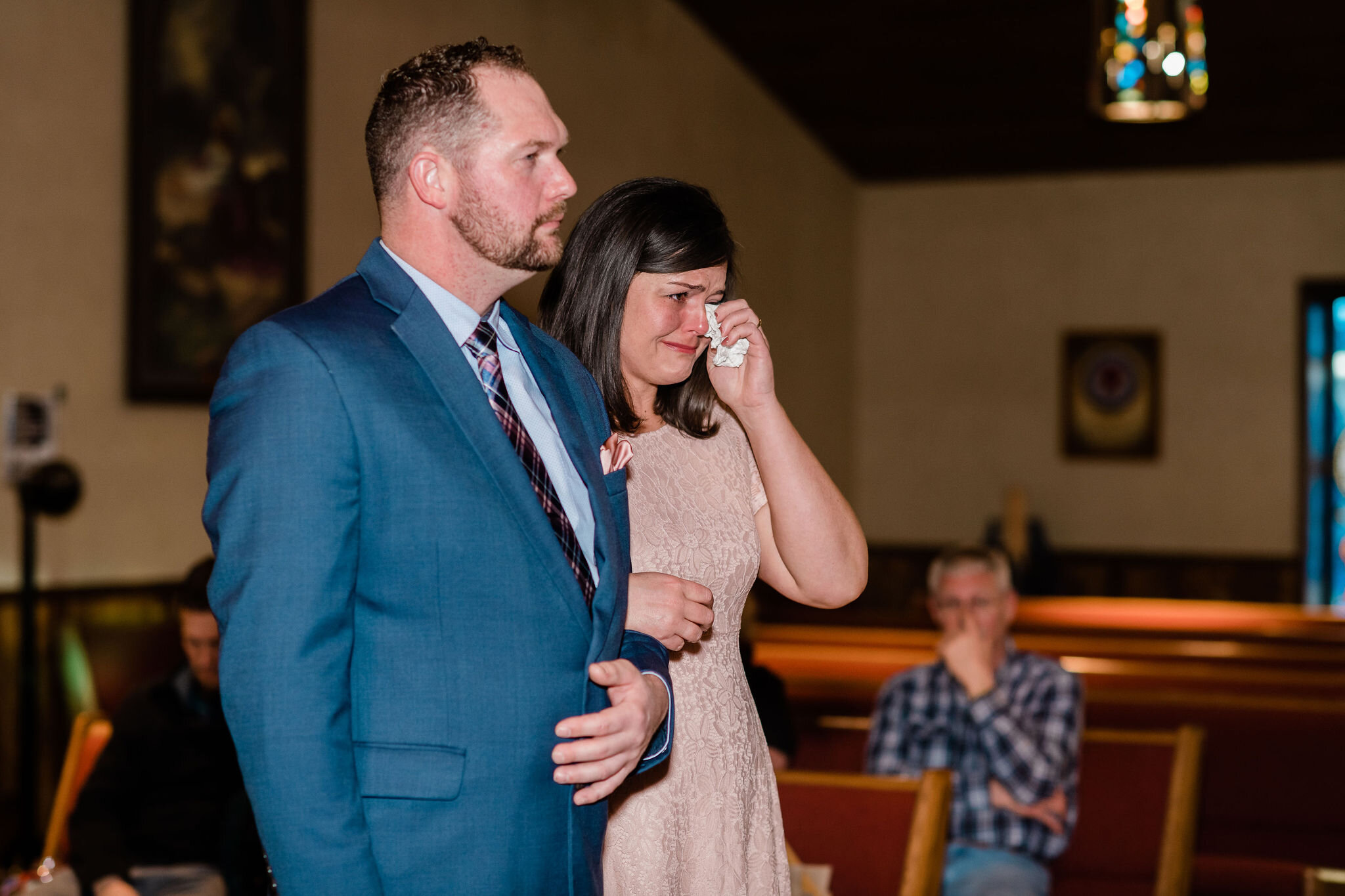 Bride crying at the altar