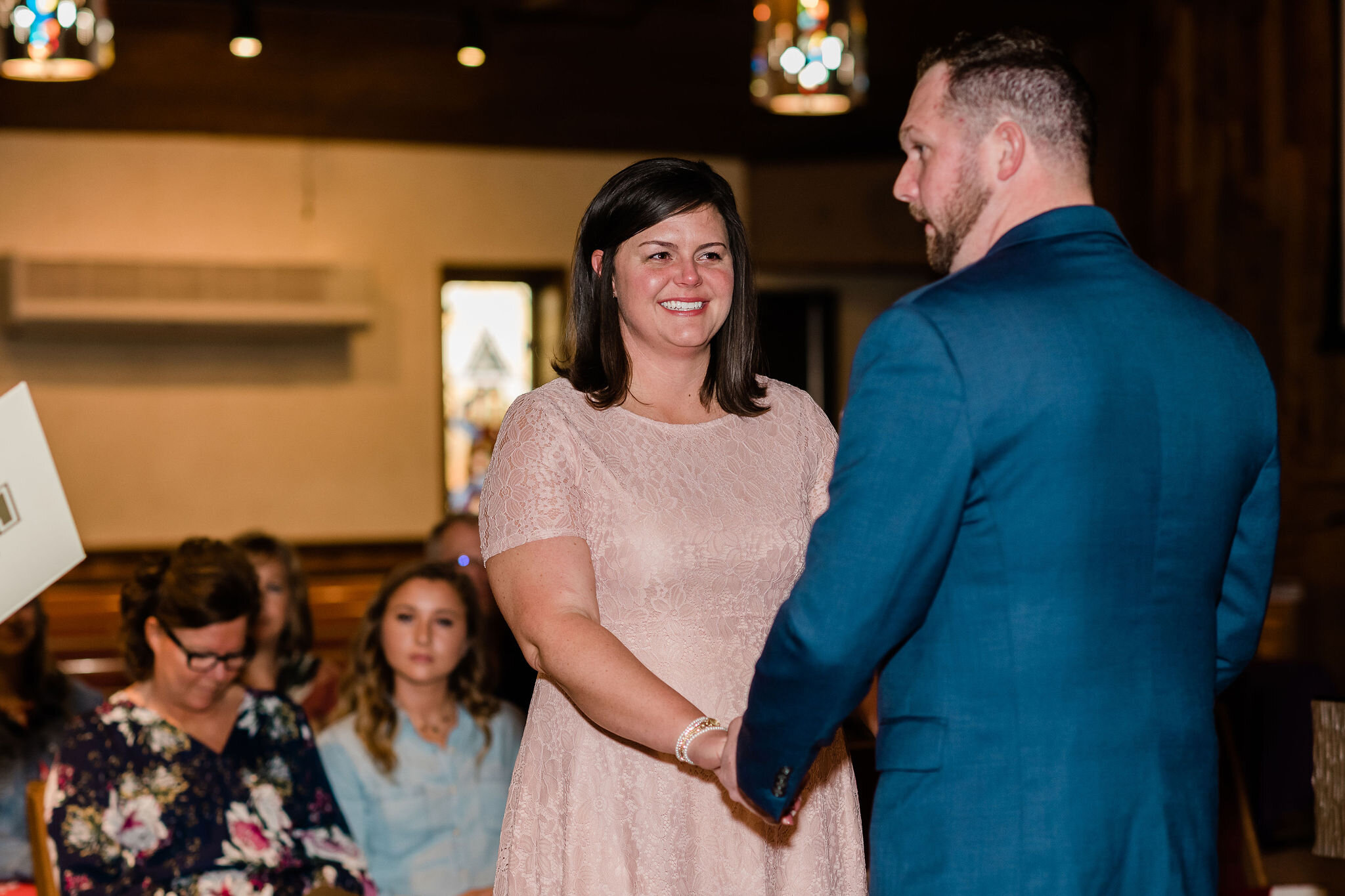 Bride smiling at groom