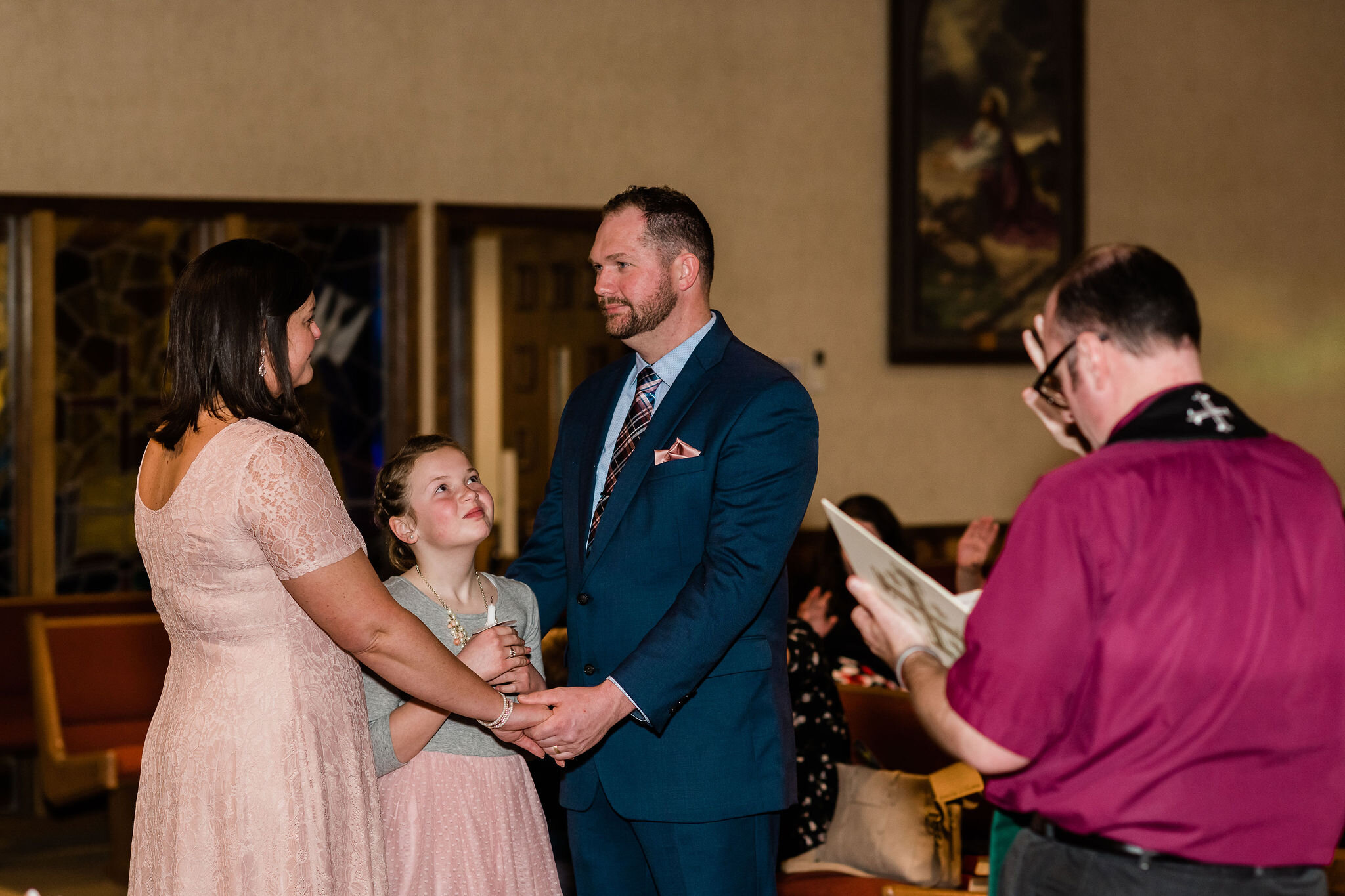 Bride and groom holding hands