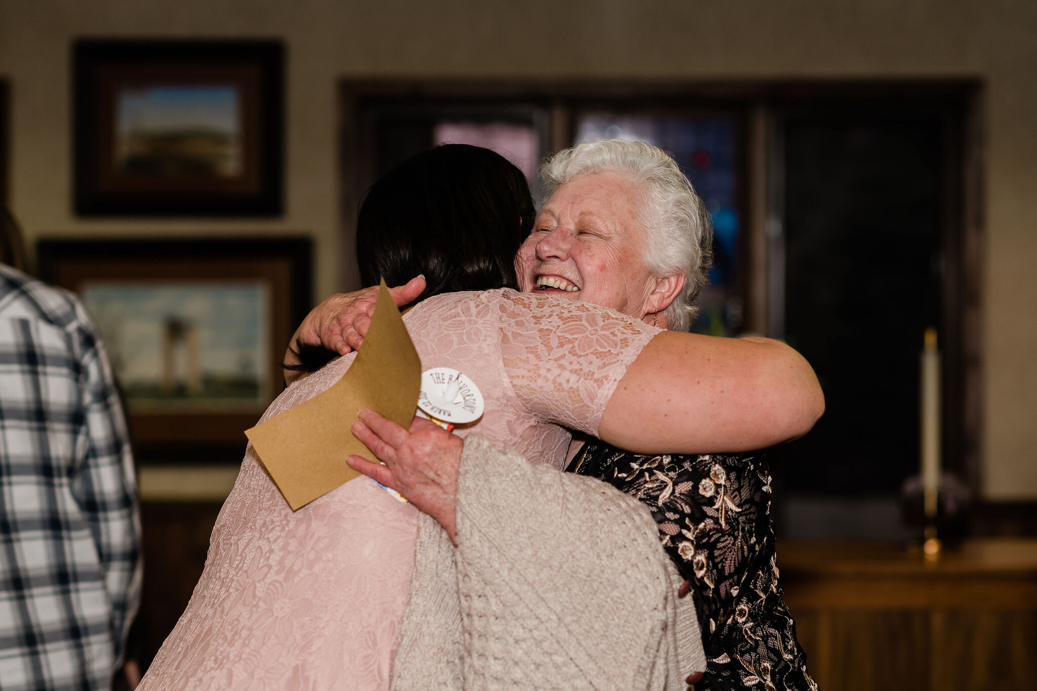 Bride hugging grandmother