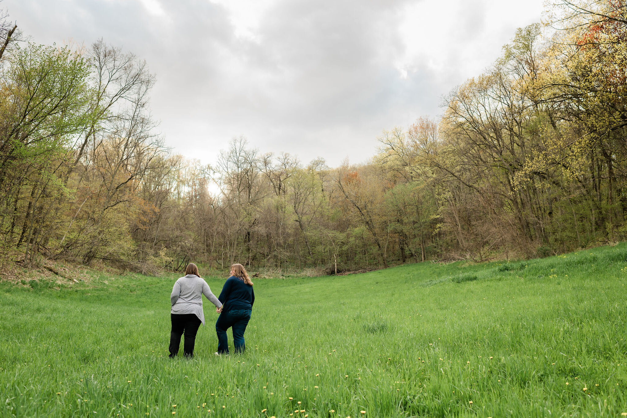 Women walking together in a field