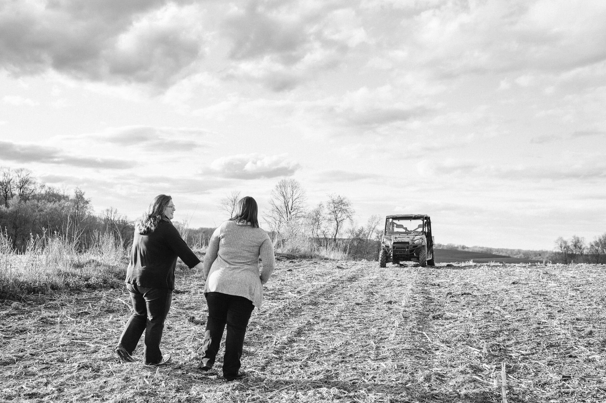 Women walking toward a tractor