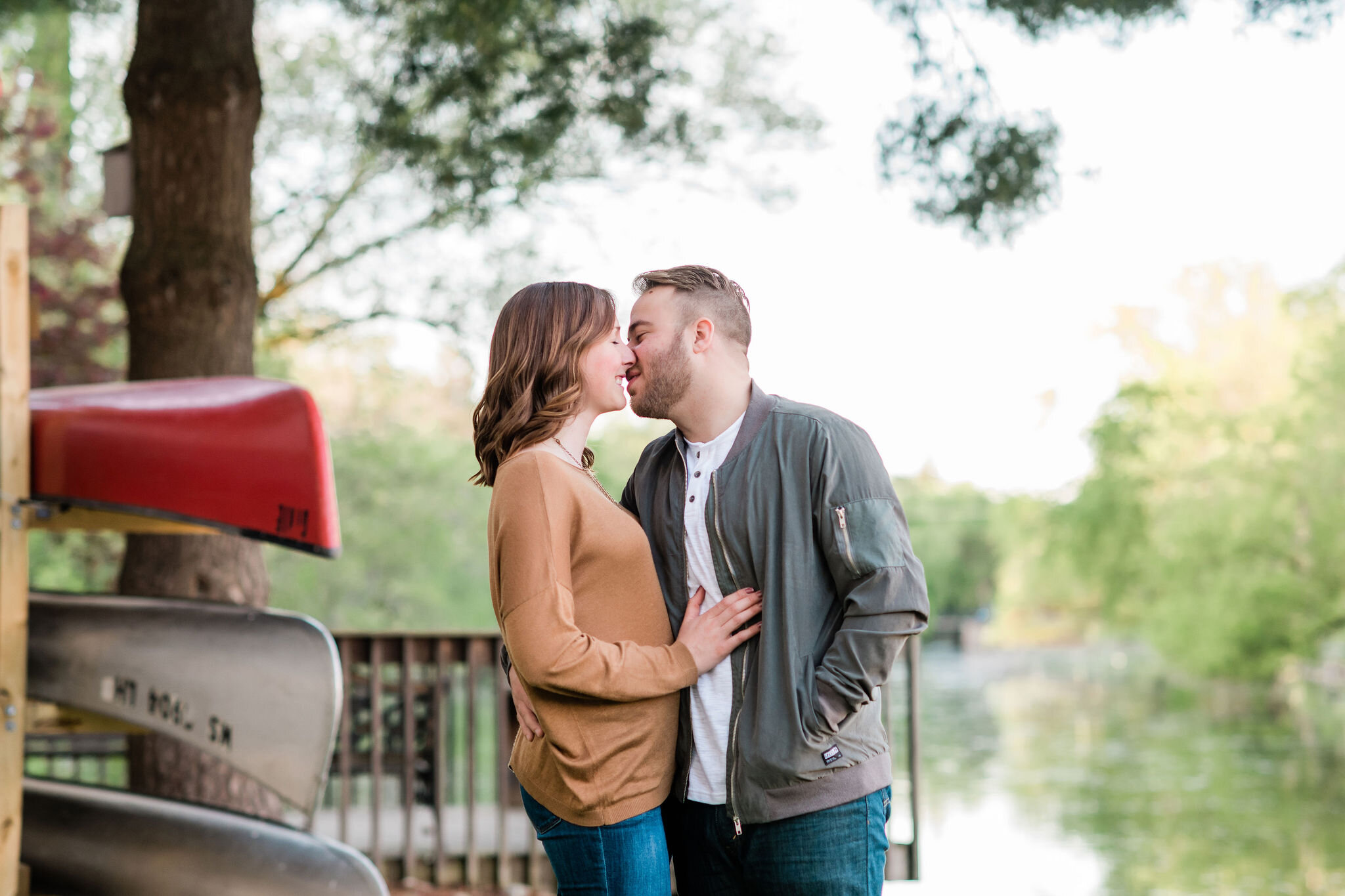 Engaged couple kissing