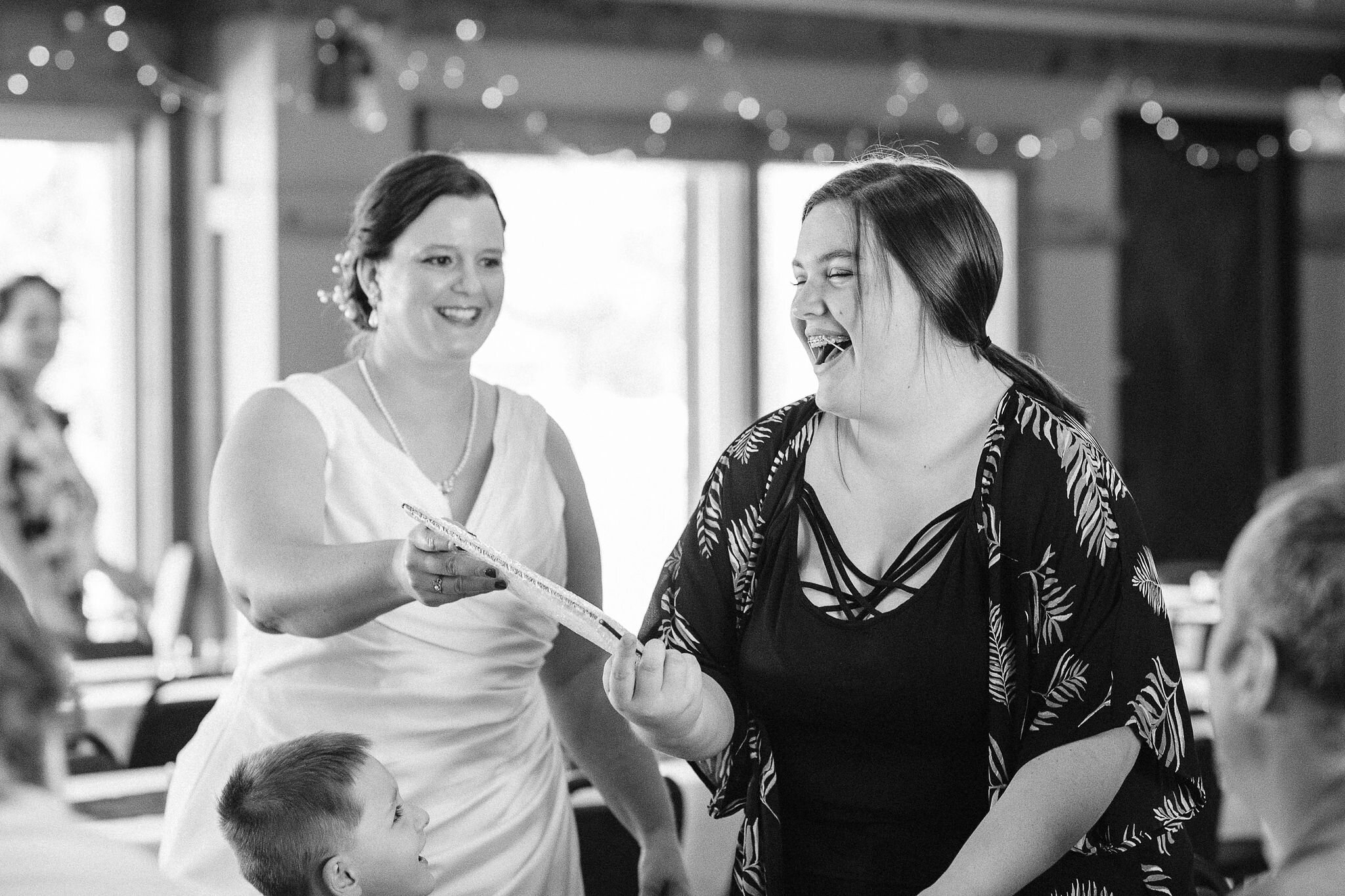 Bride giving her niece a birthday present