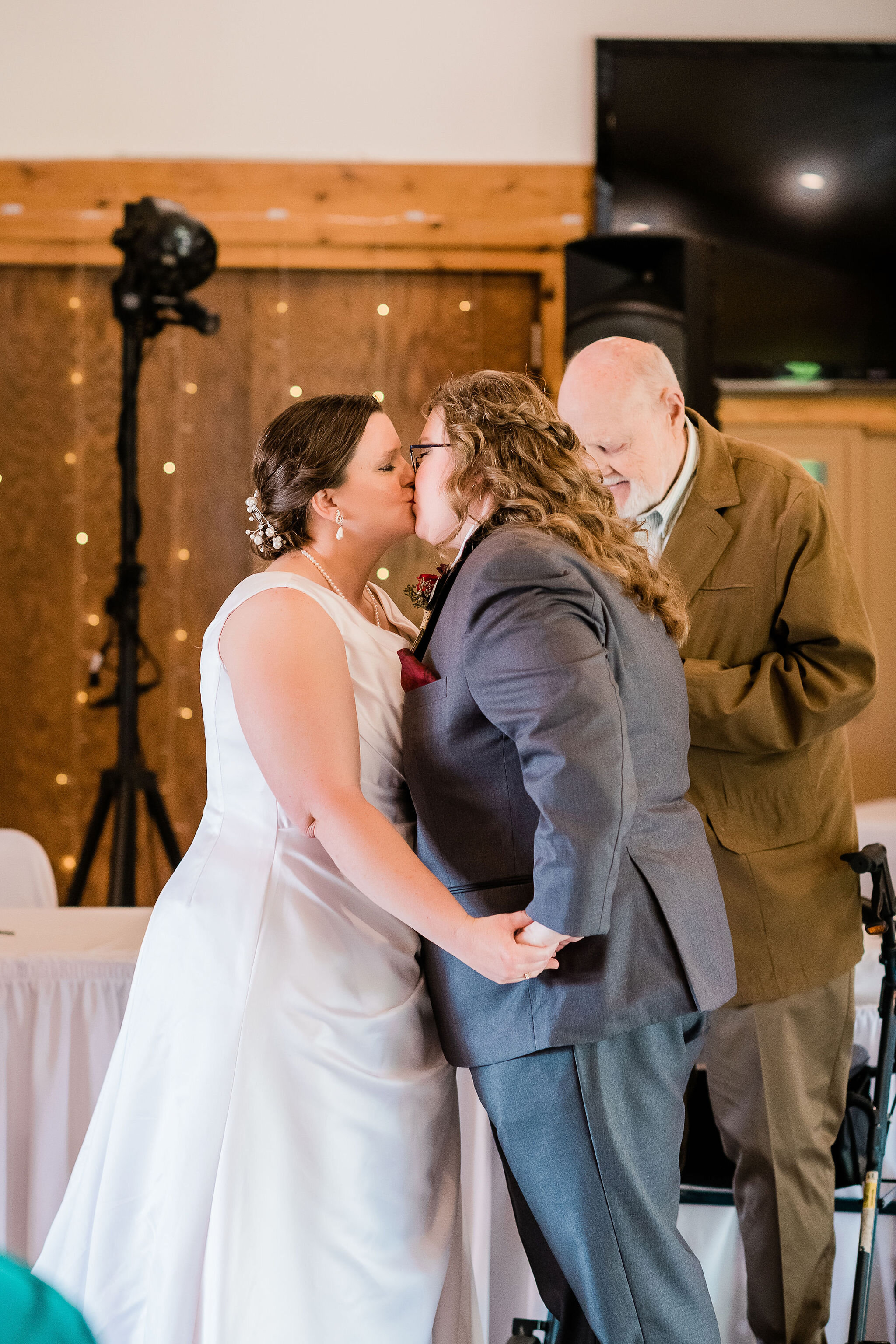 Bride and bride's first kiss