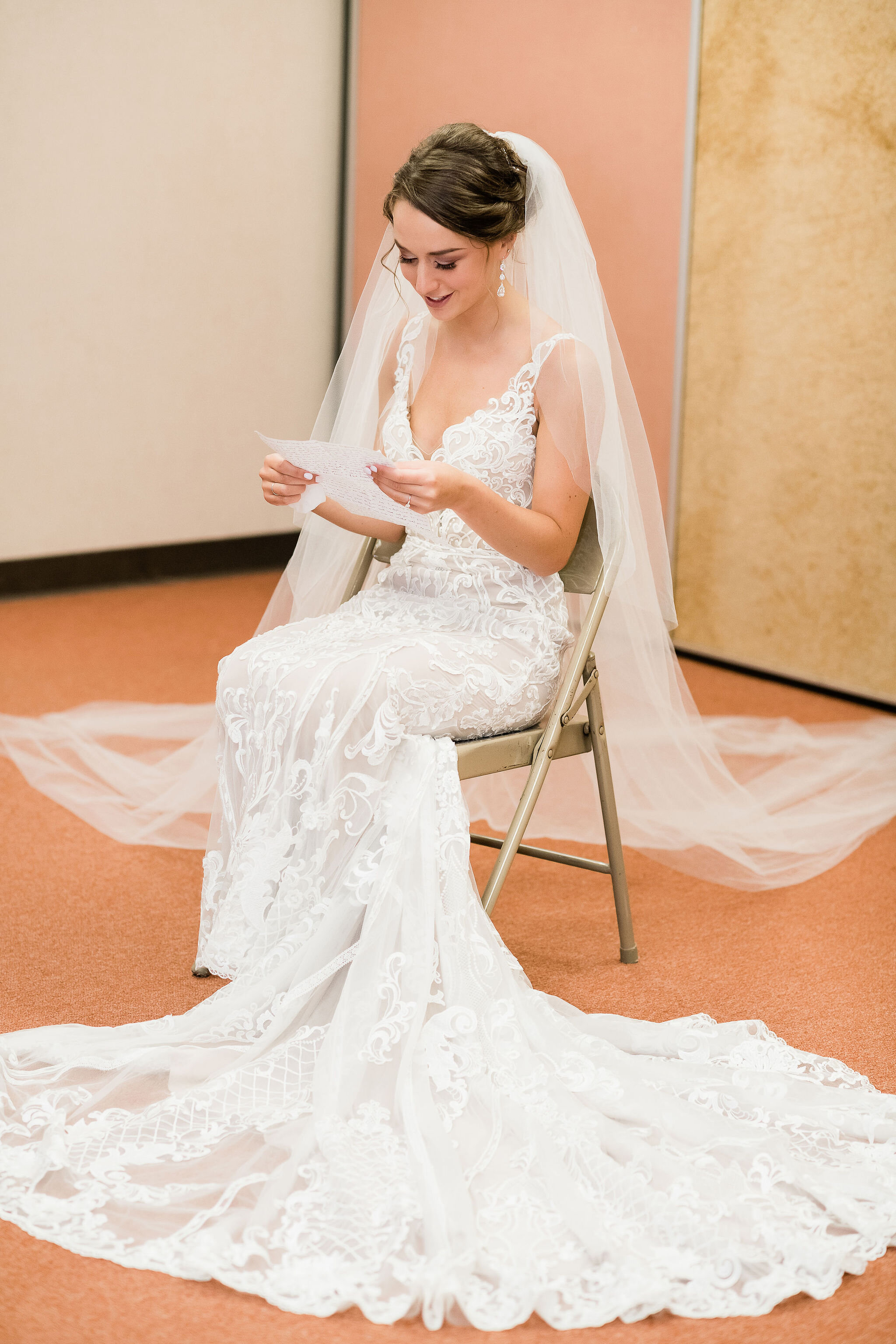 Bride reading a letter from her husband to be