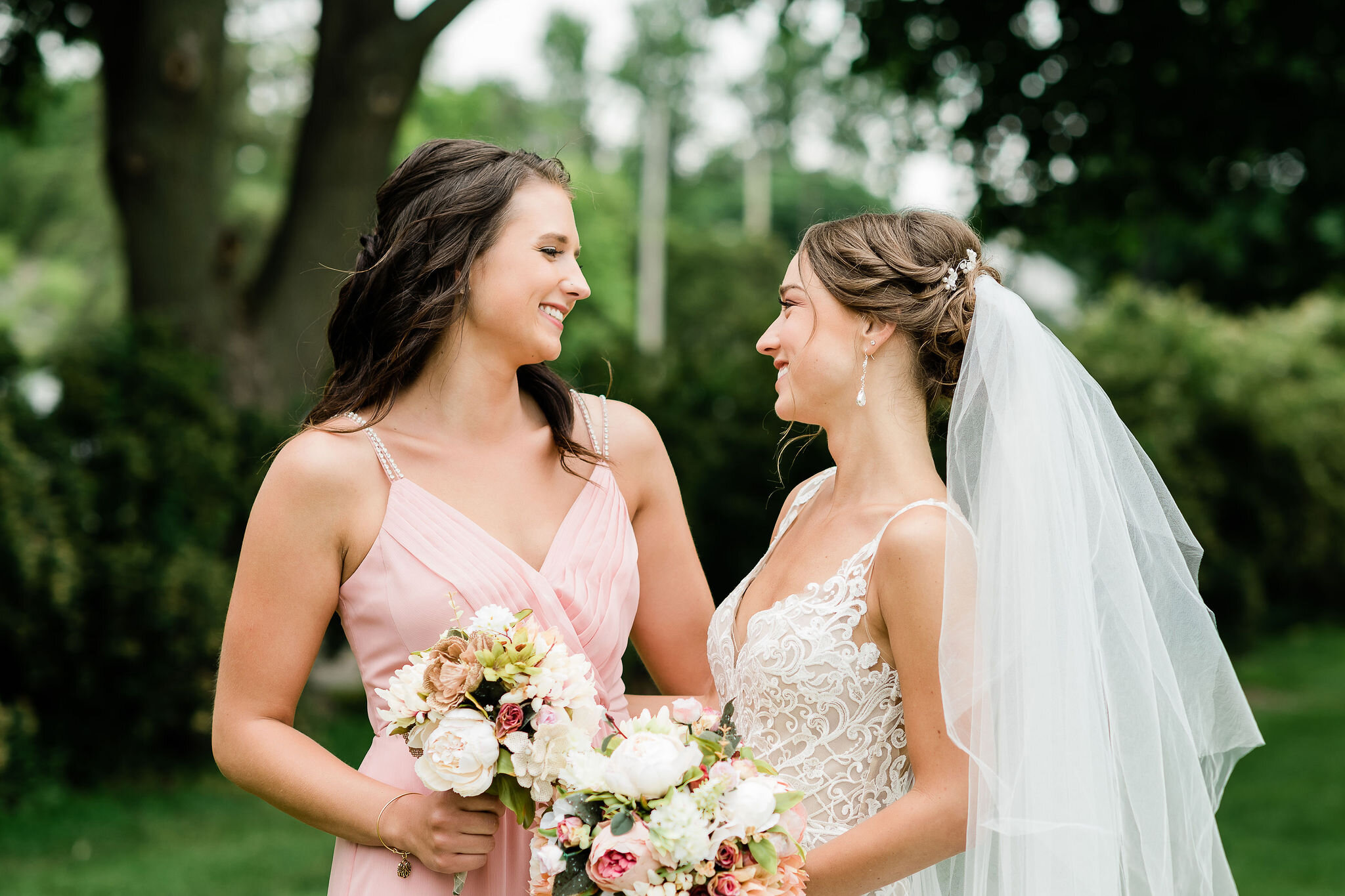 Bride and bridesmaid