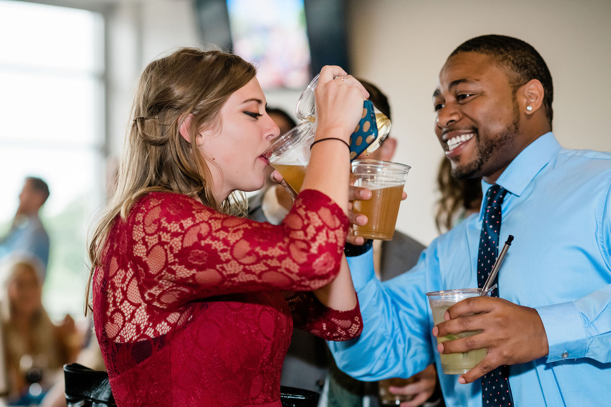 Wedding guests drinking beer