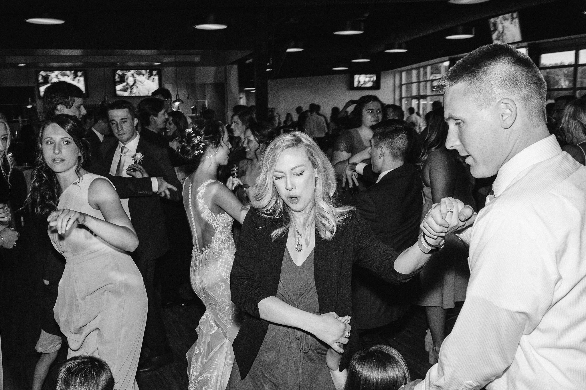 Wedding guests dancing