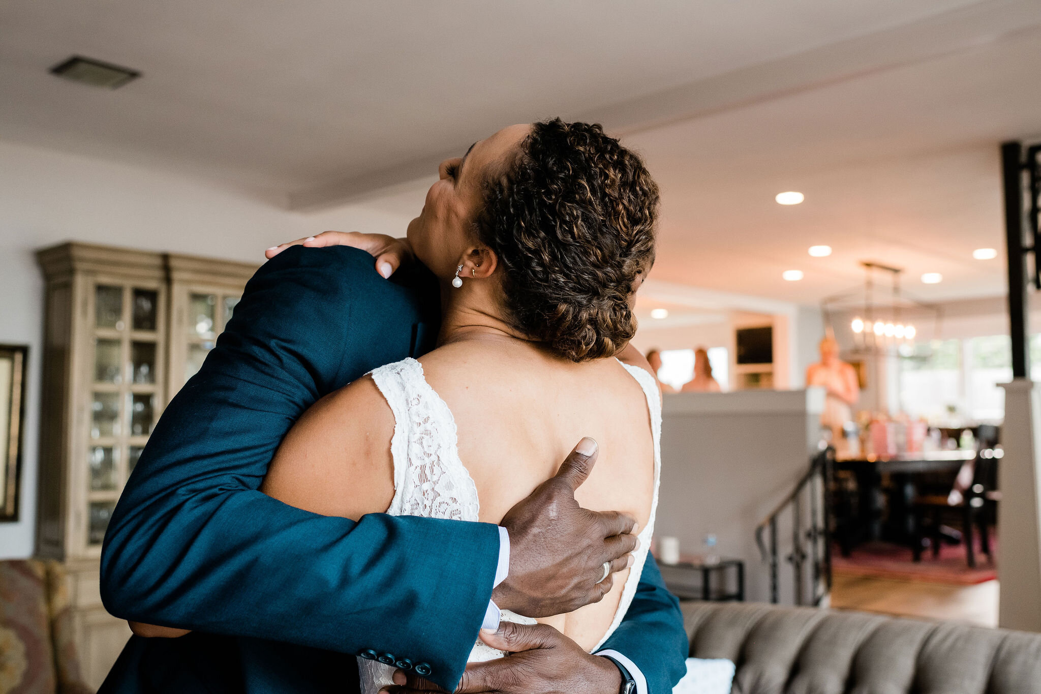 Bride and her father hugging