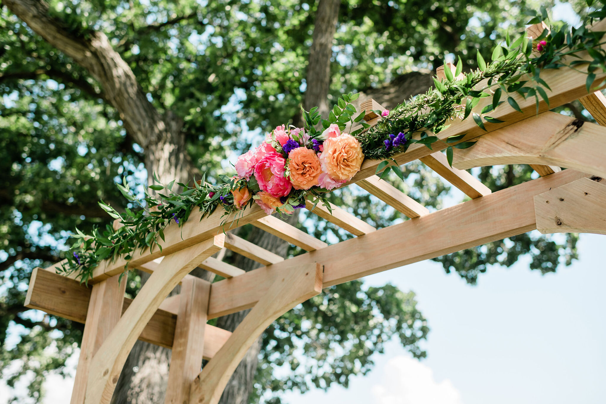 Flowers on wedding arbor