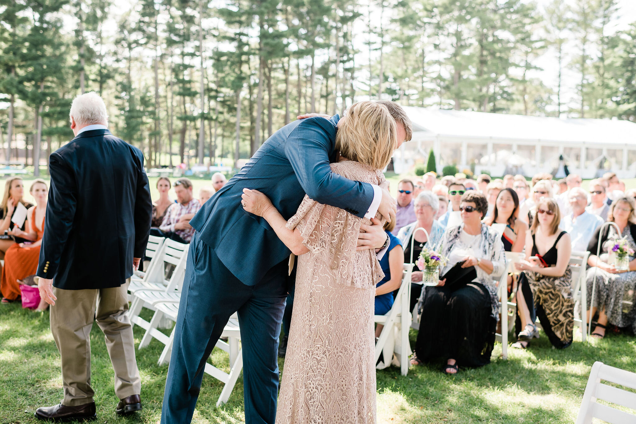 Groom hugging his mom