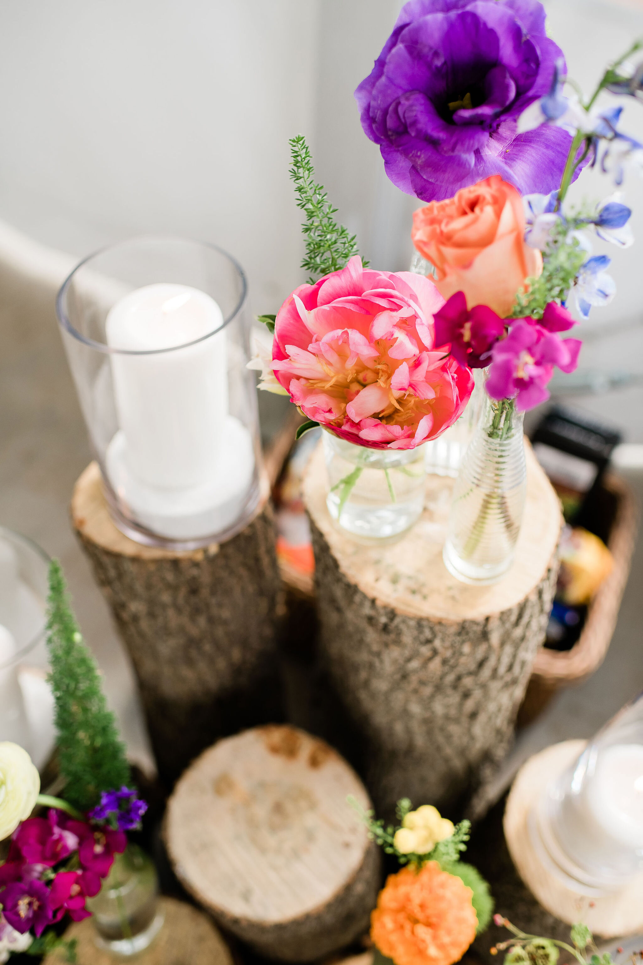 Wooden and floral arrangement with candles