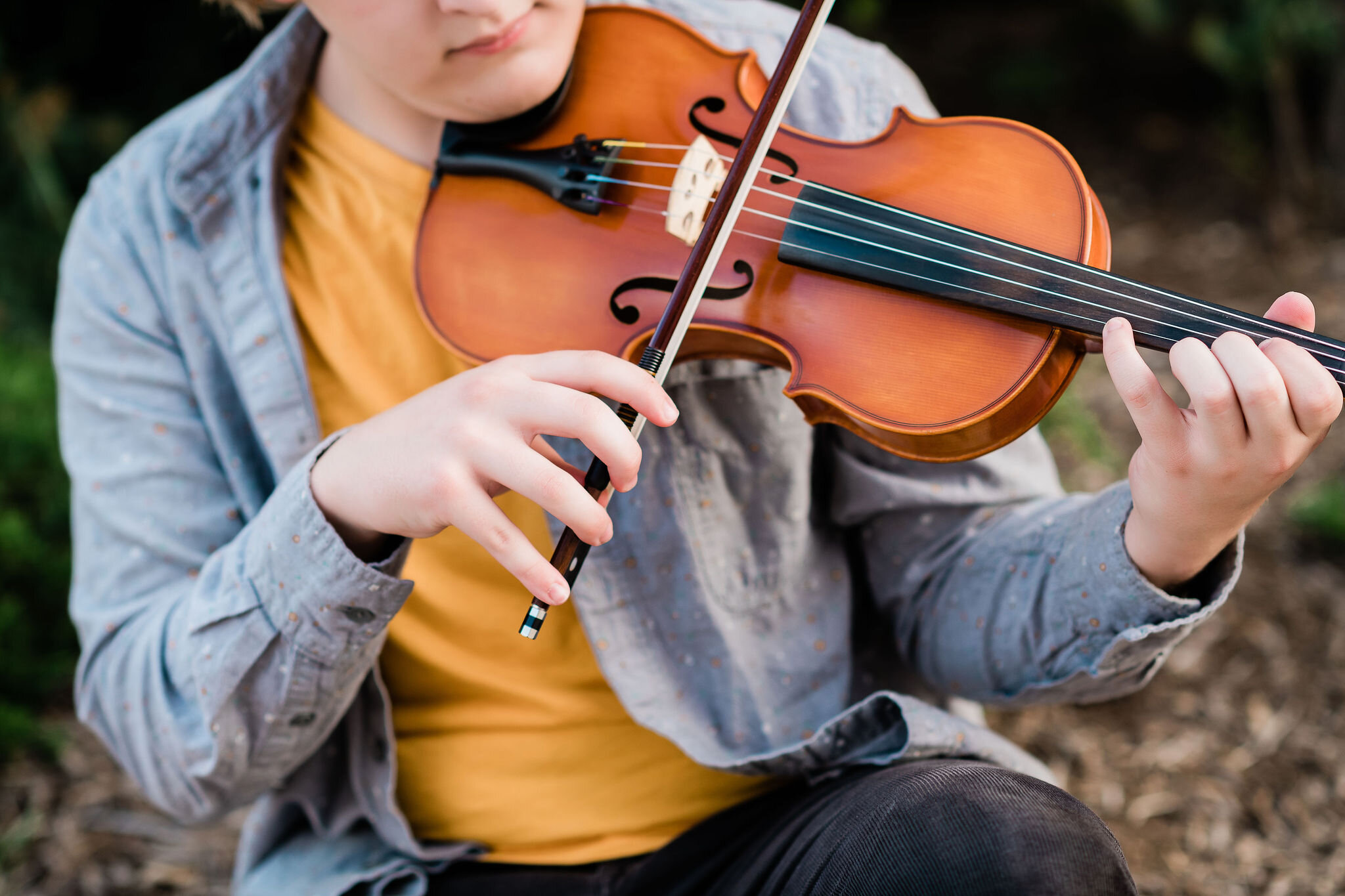 High school senior playing violin