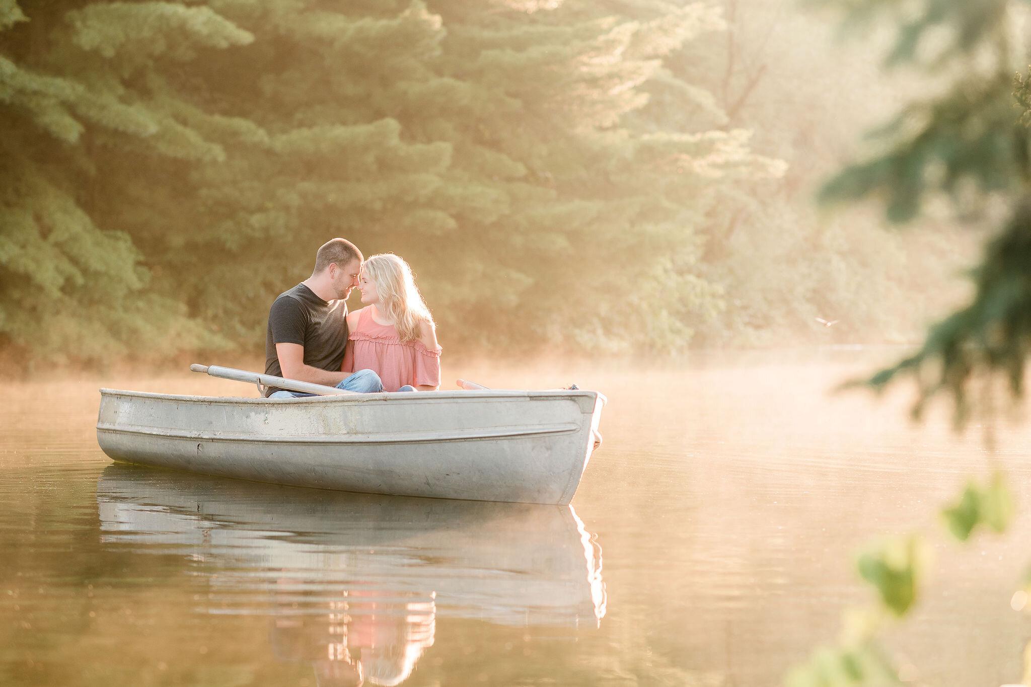 Engaged couple in a boat