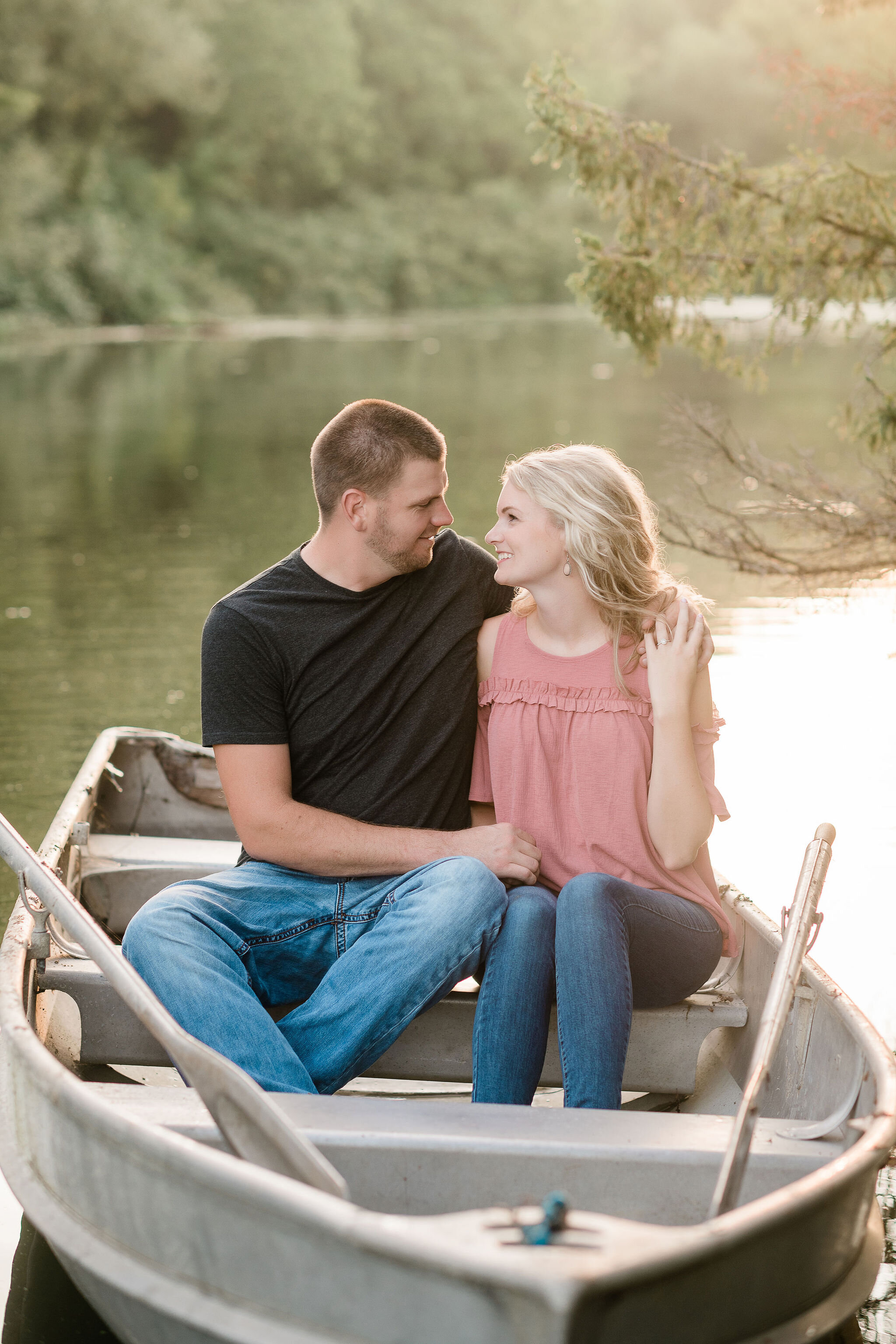 Engaged couple in a boat