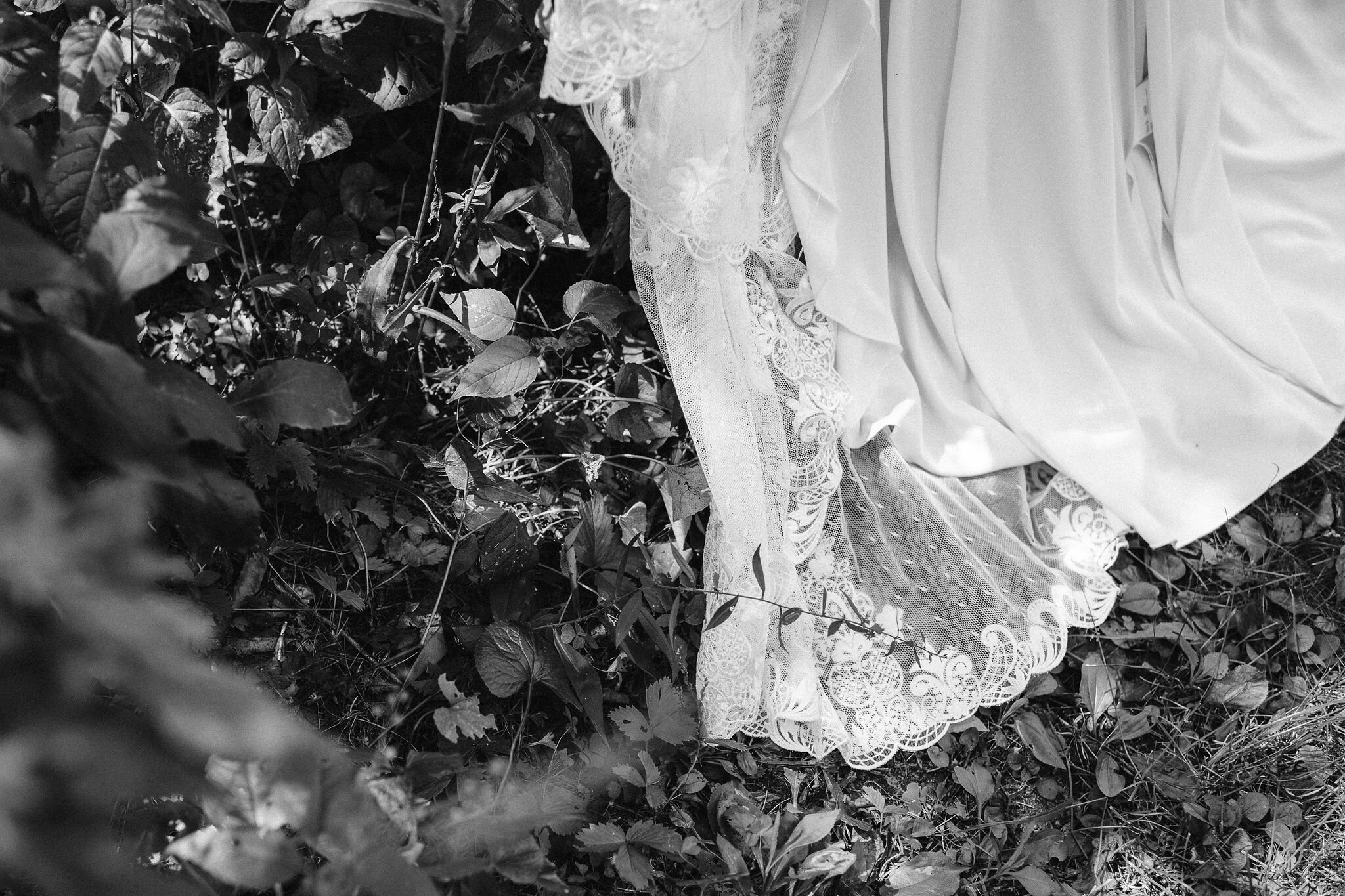 Bottom of wedding dress in the leaves