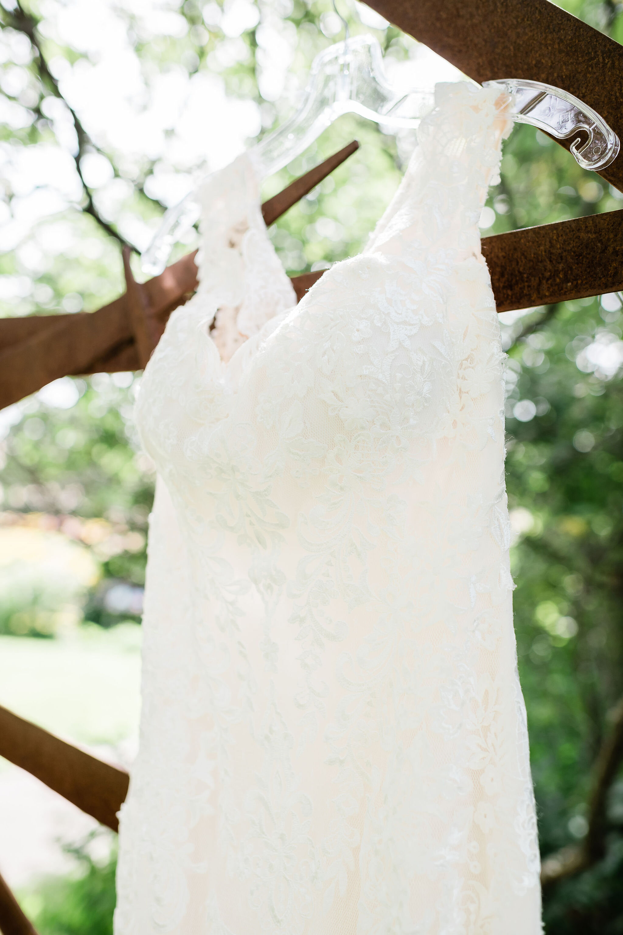 Top of wedding dress on a hanger