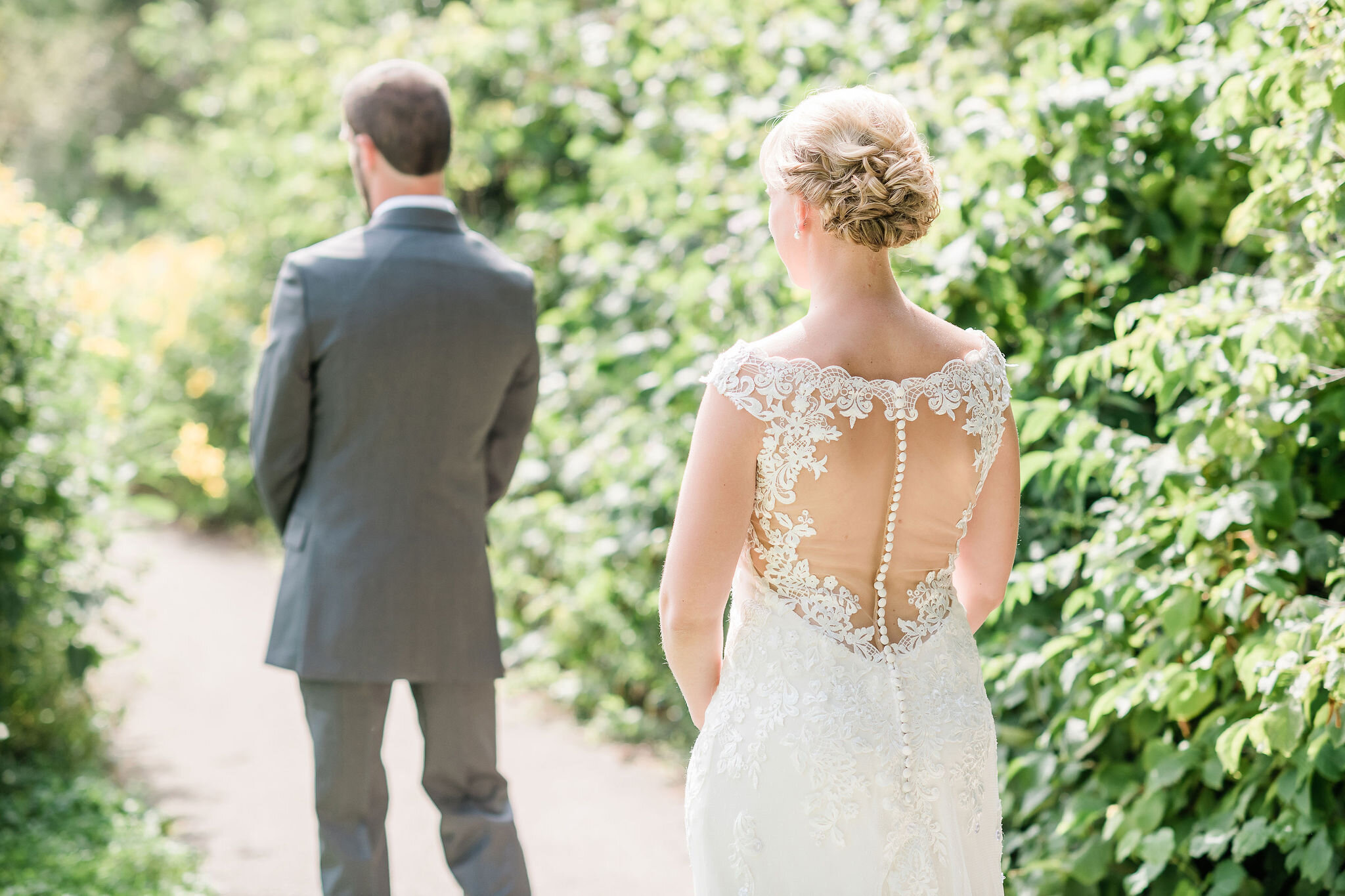 Bride behind the groom right before their first look