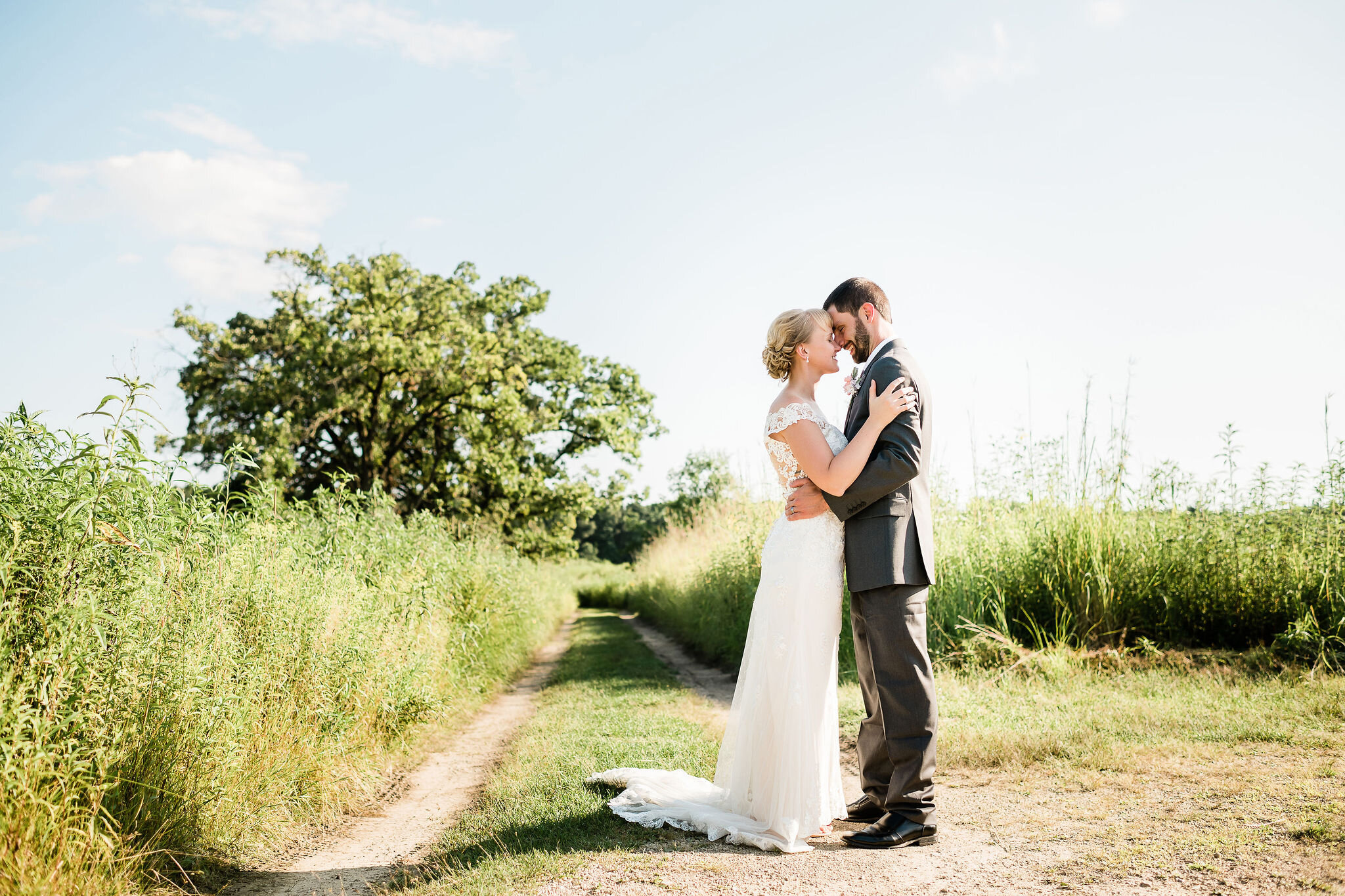 Bride and groom facing each other