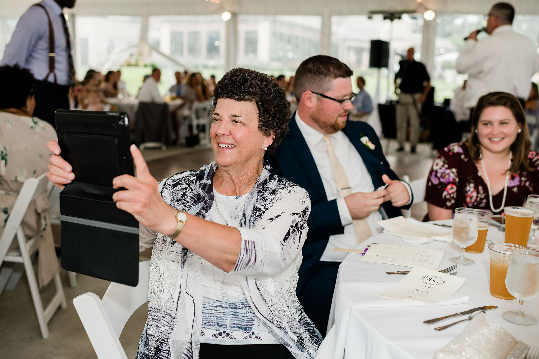 Wedding guest taking a photo