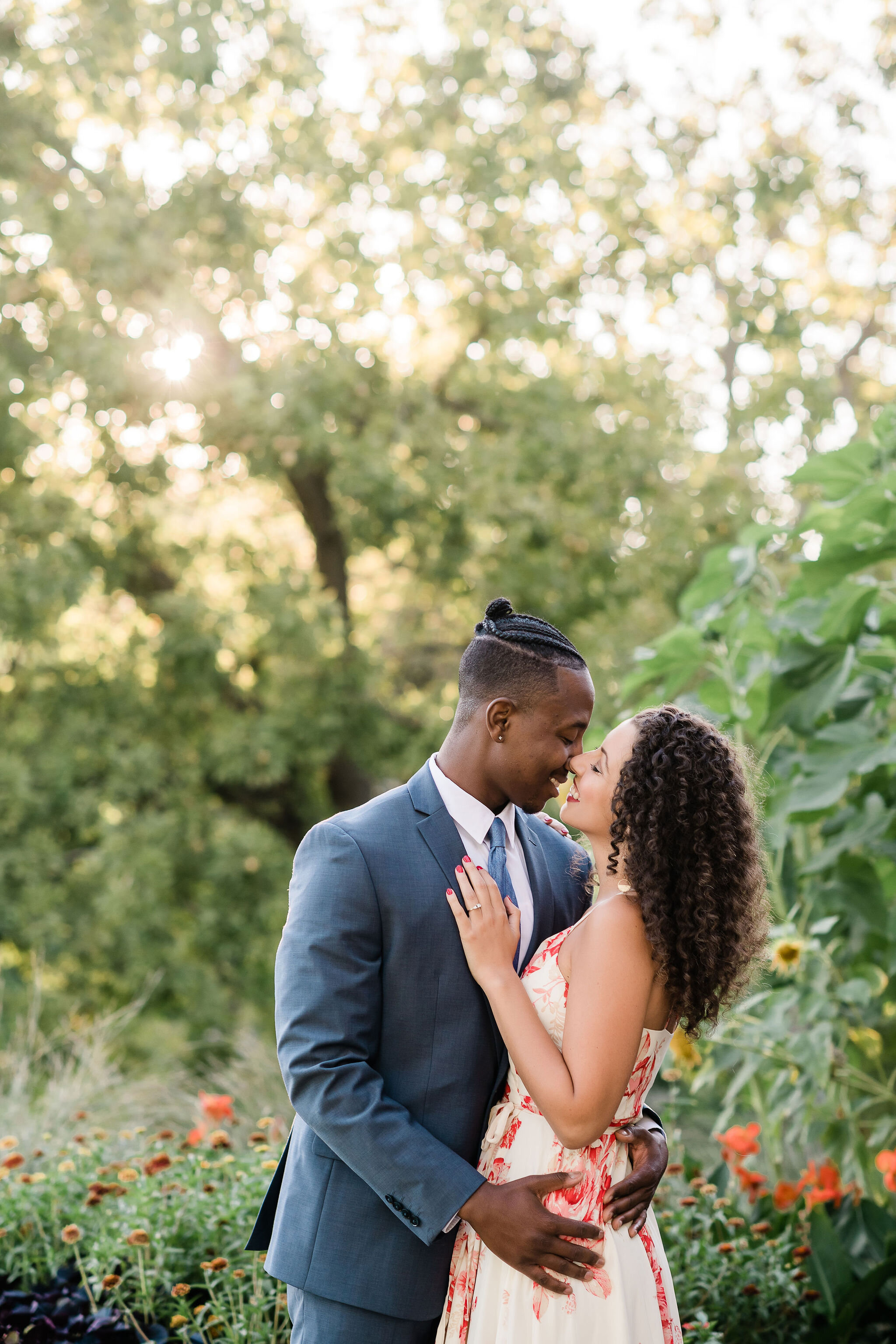 Engaged couple kissing