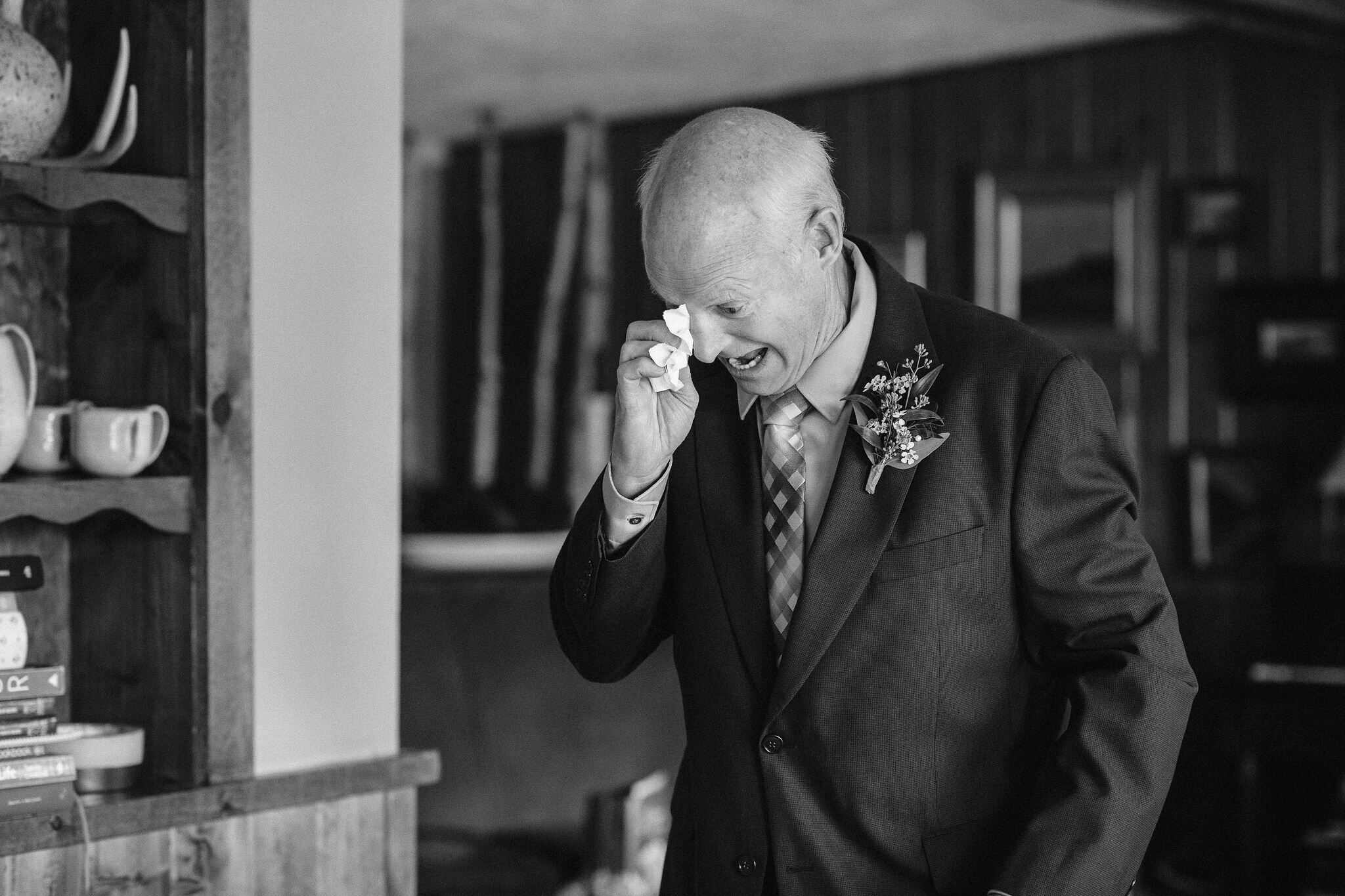 Father of the bride crying