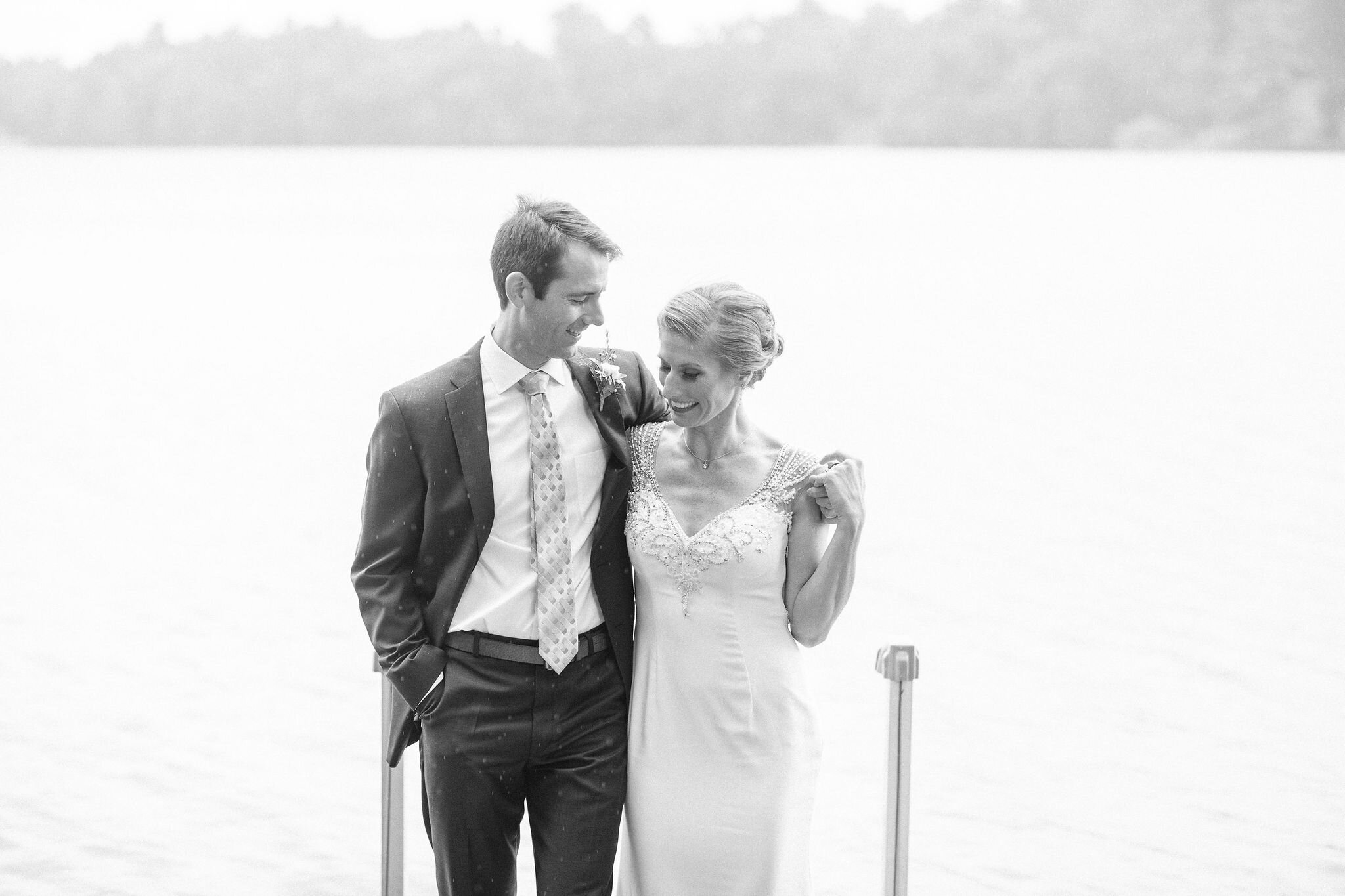 Bride and groom on a dock