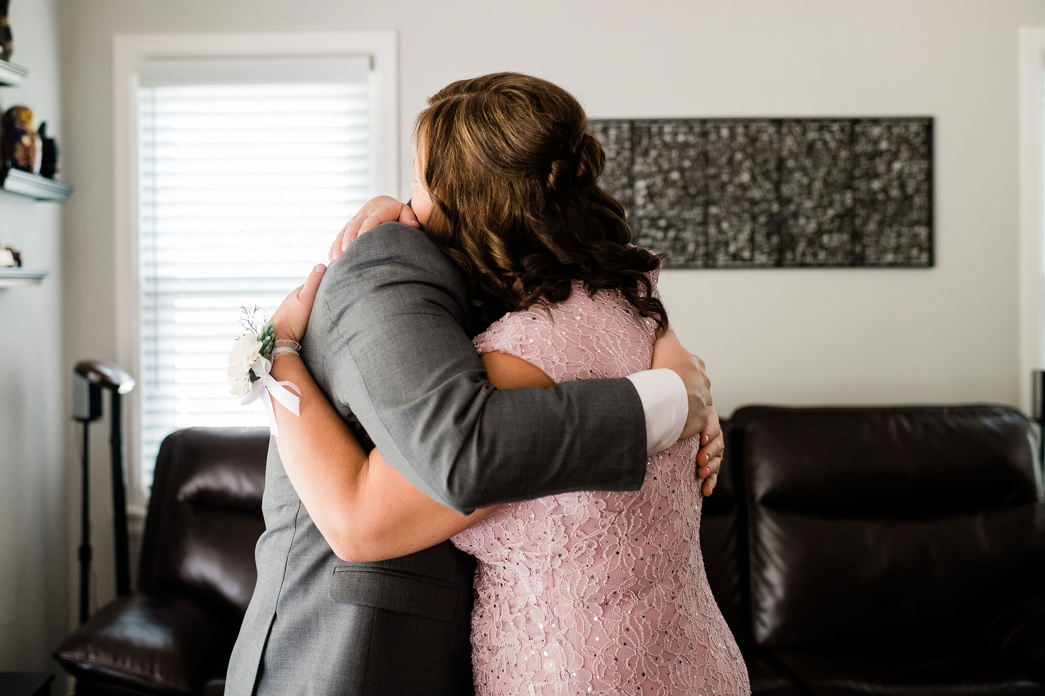 Groom and his mother hugging