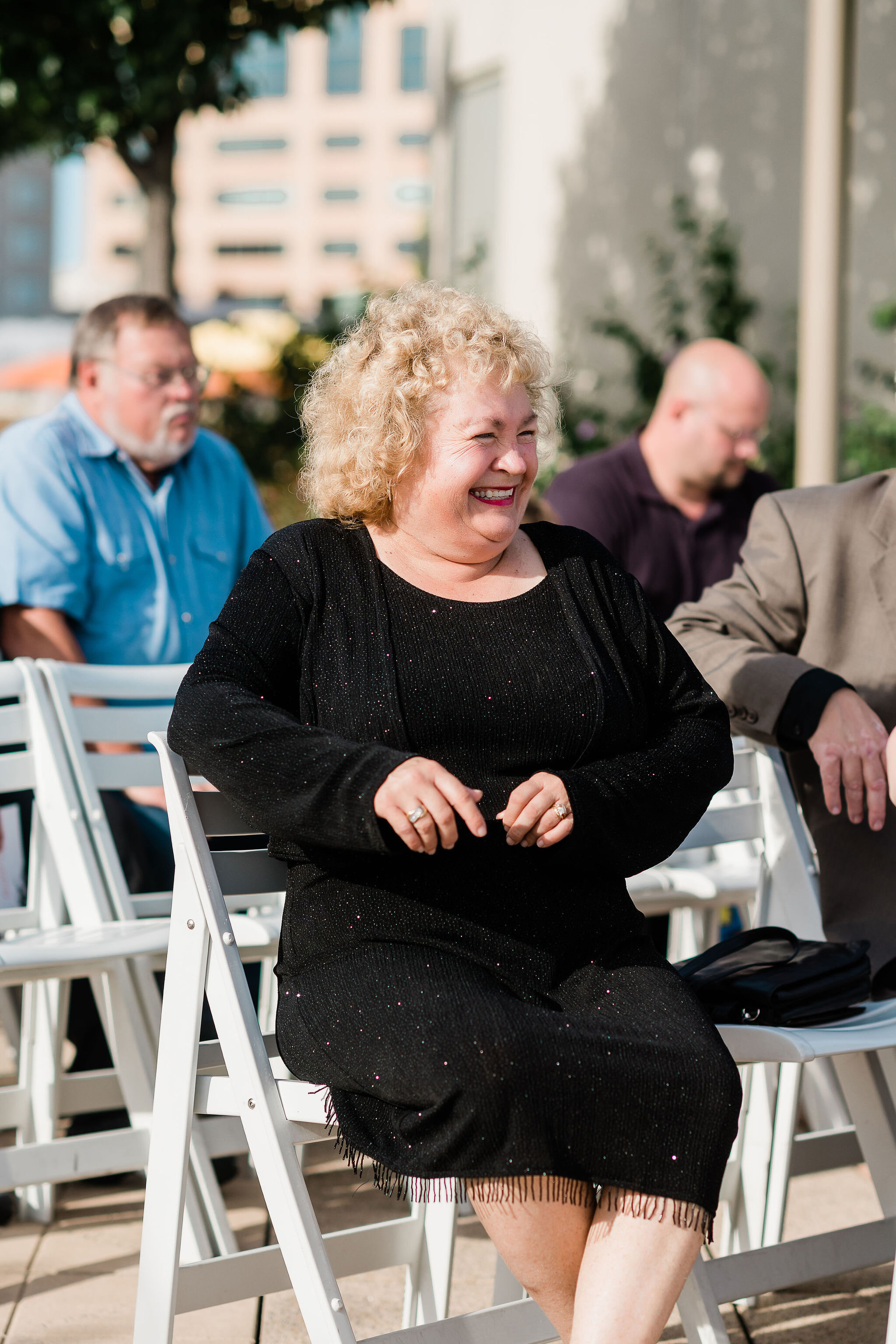 Wedding guest laughing