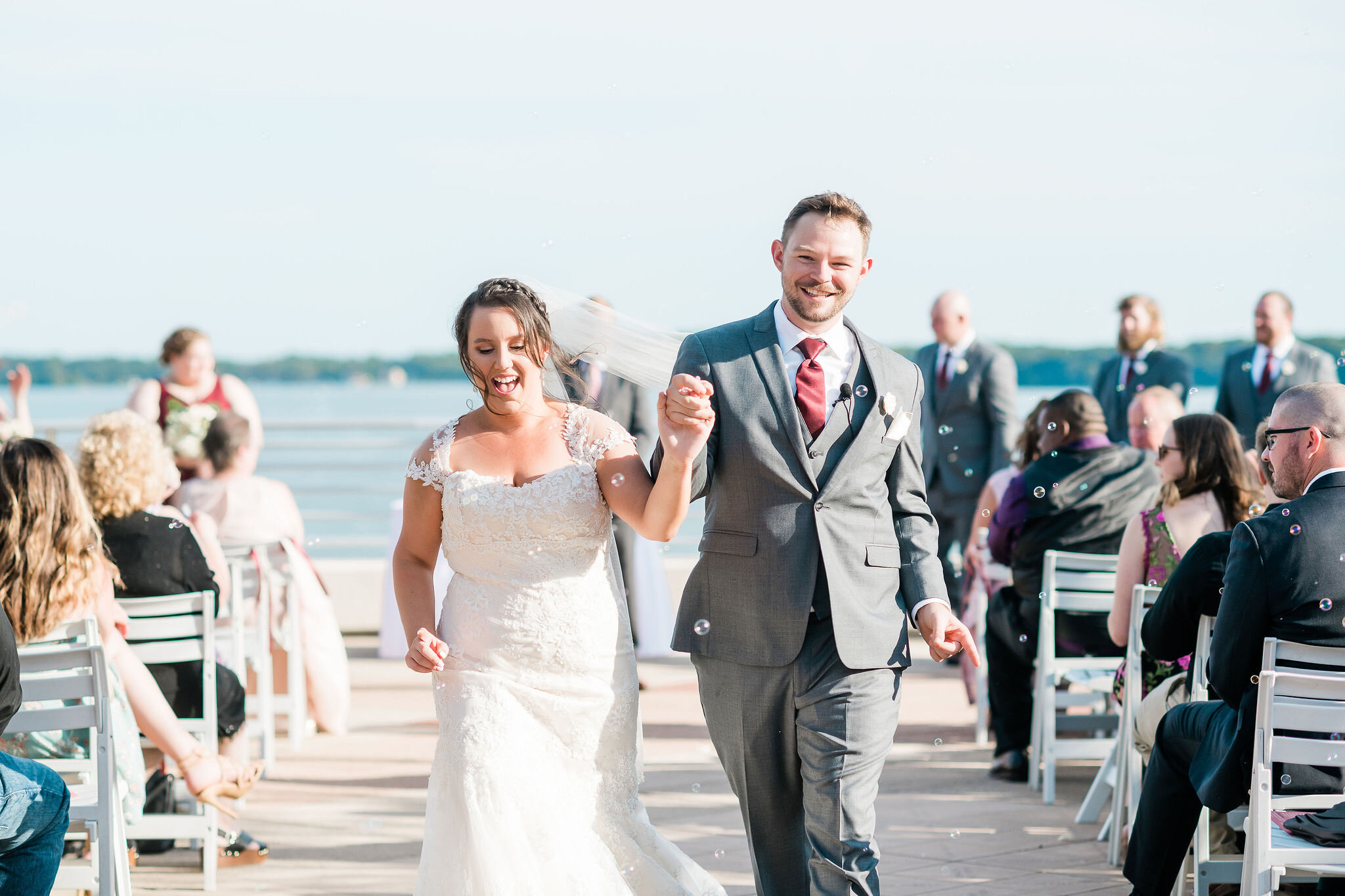 Bride and groom walking down the aisle