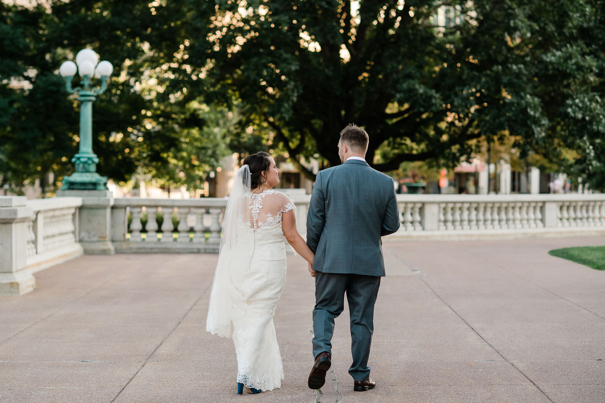 Bride and groom walking away