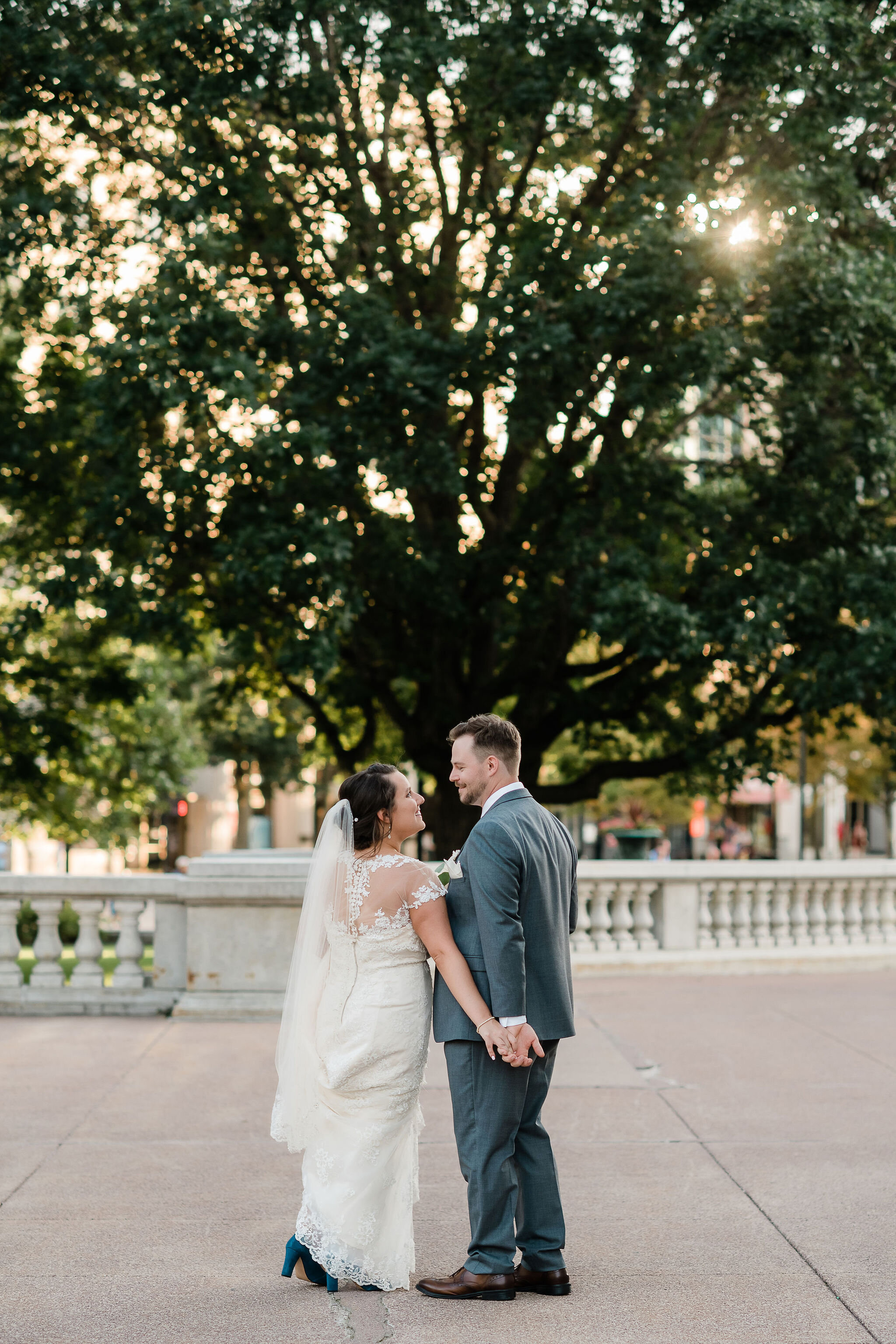 Bride and groom looking at each other