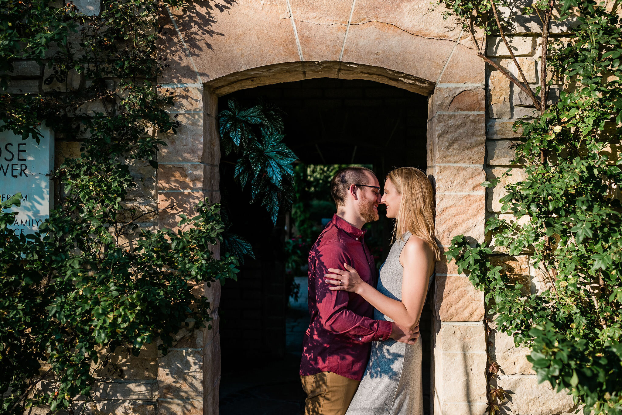 Engaged couple in a doorway