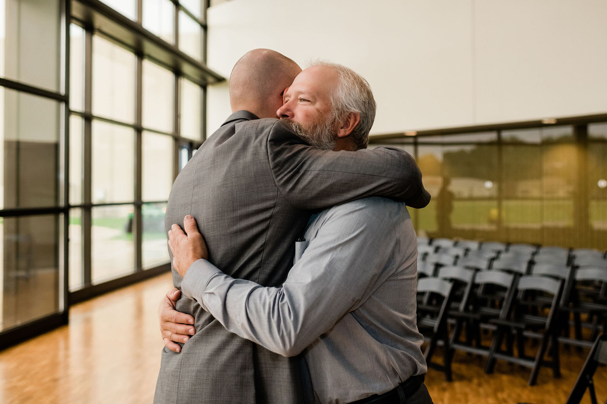 Groom and his dad hugging