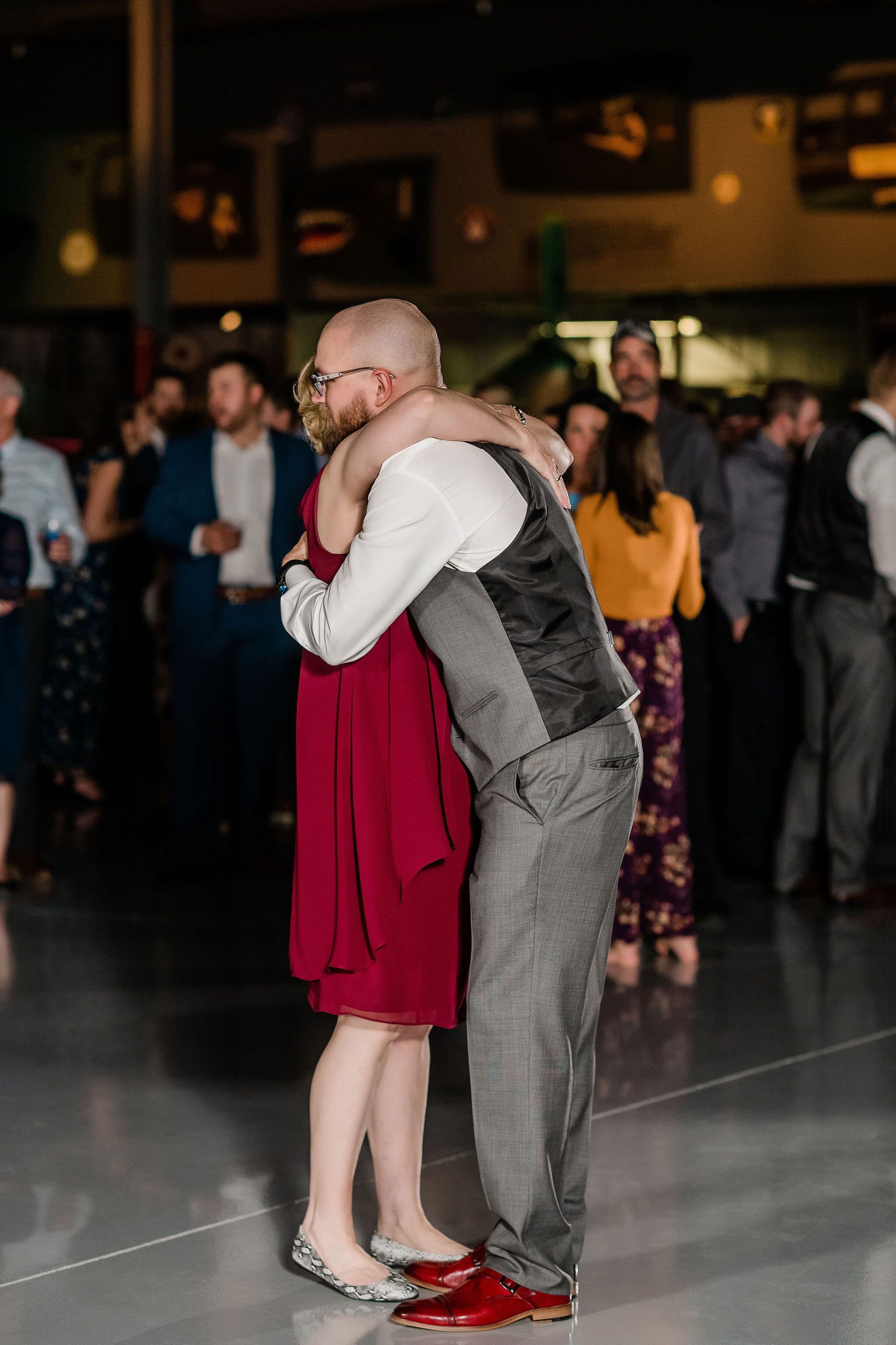 Groom hugging his mother