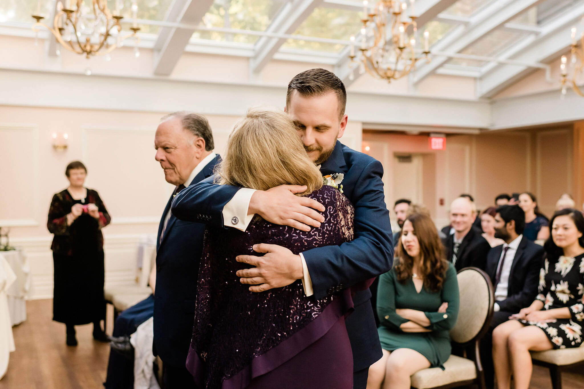 Groom hugging his mom