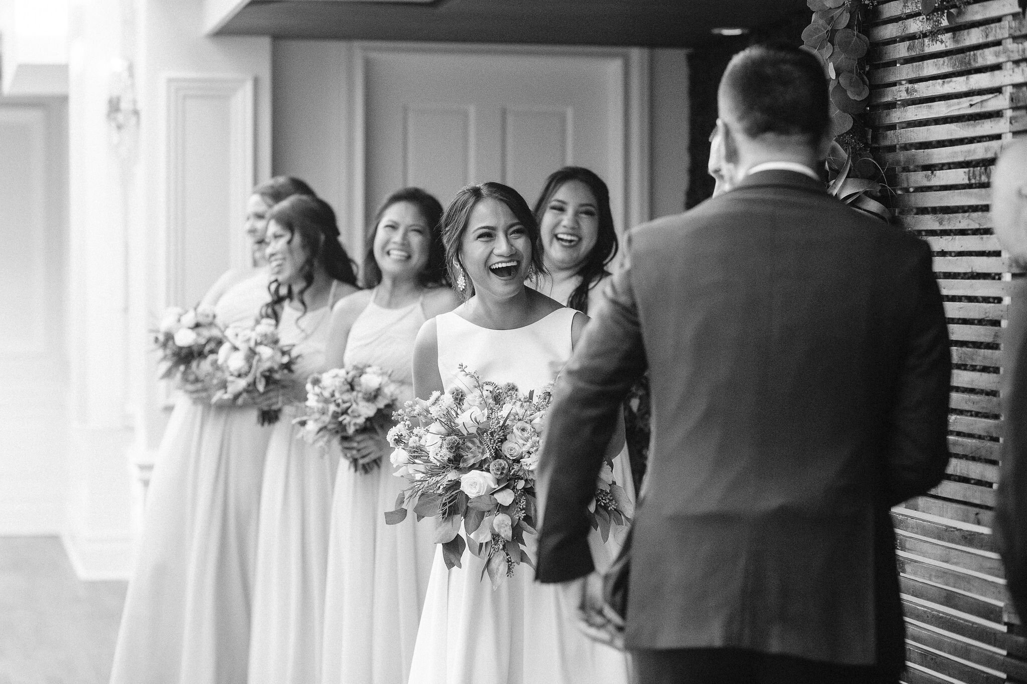 Bride laughing at groom