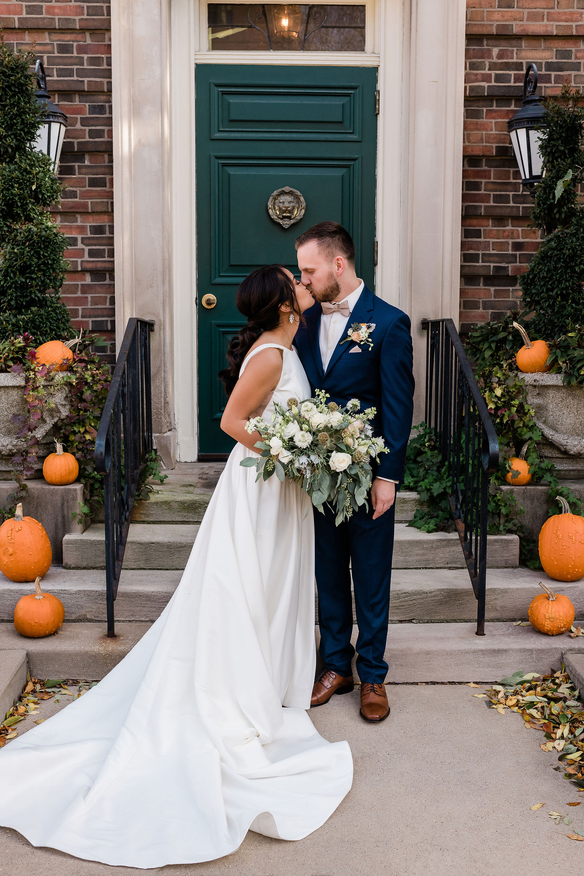 Bride and groom kissing