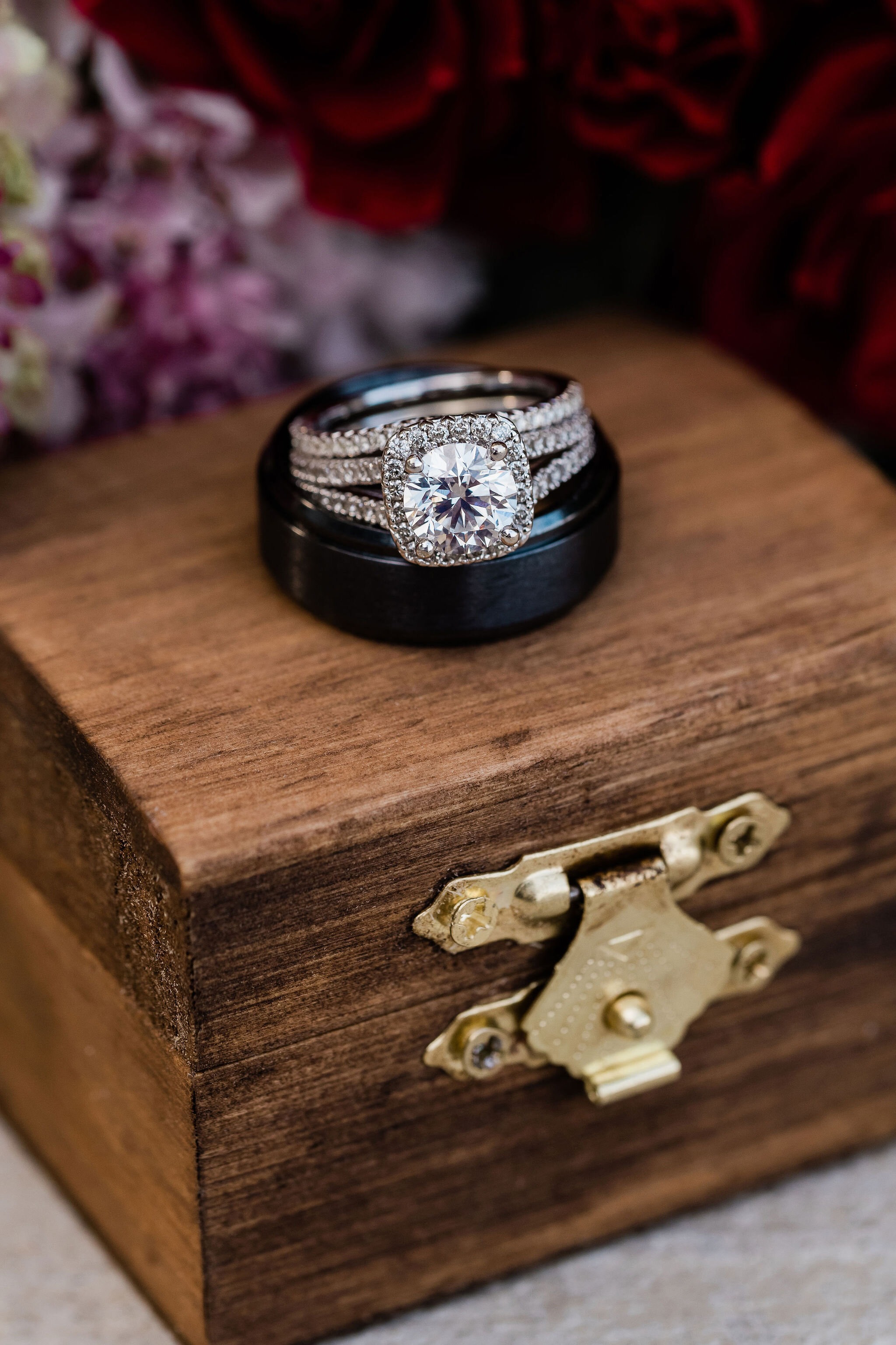 Wedding rings on a wooden ring box