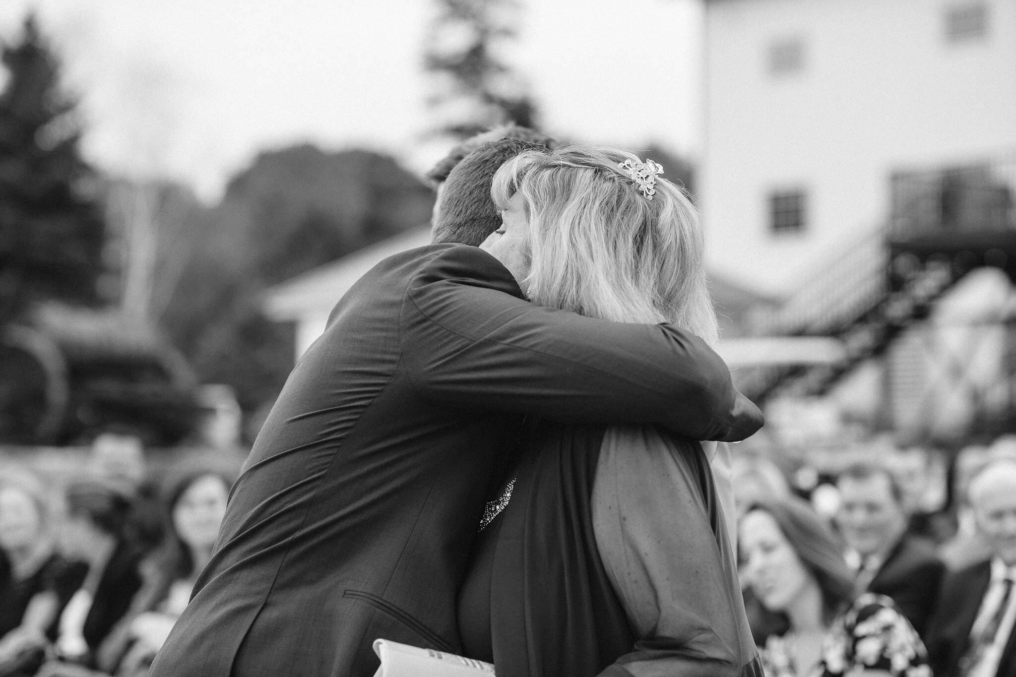 Groom hugging his mom