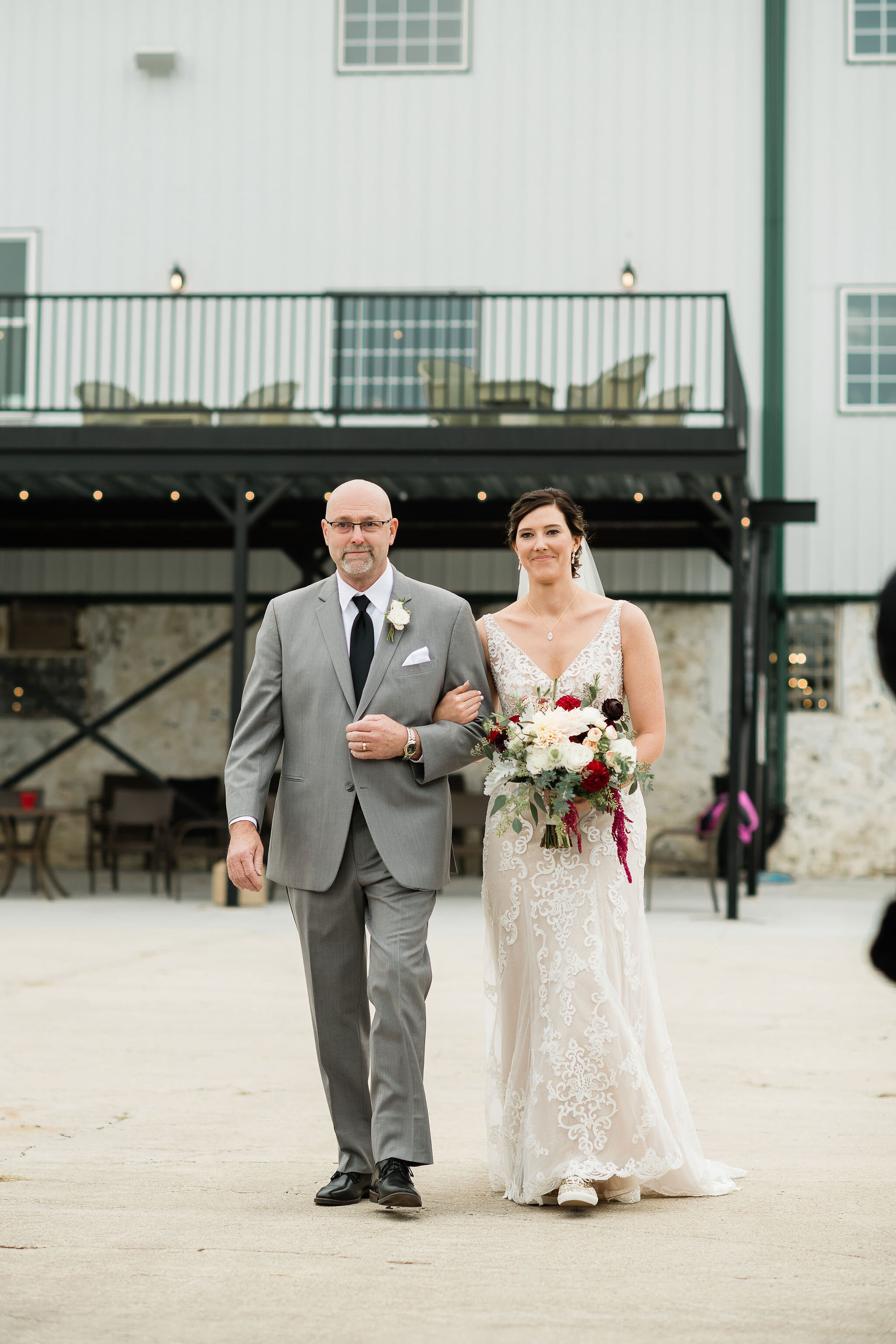 Bride and her father walking down the aisle