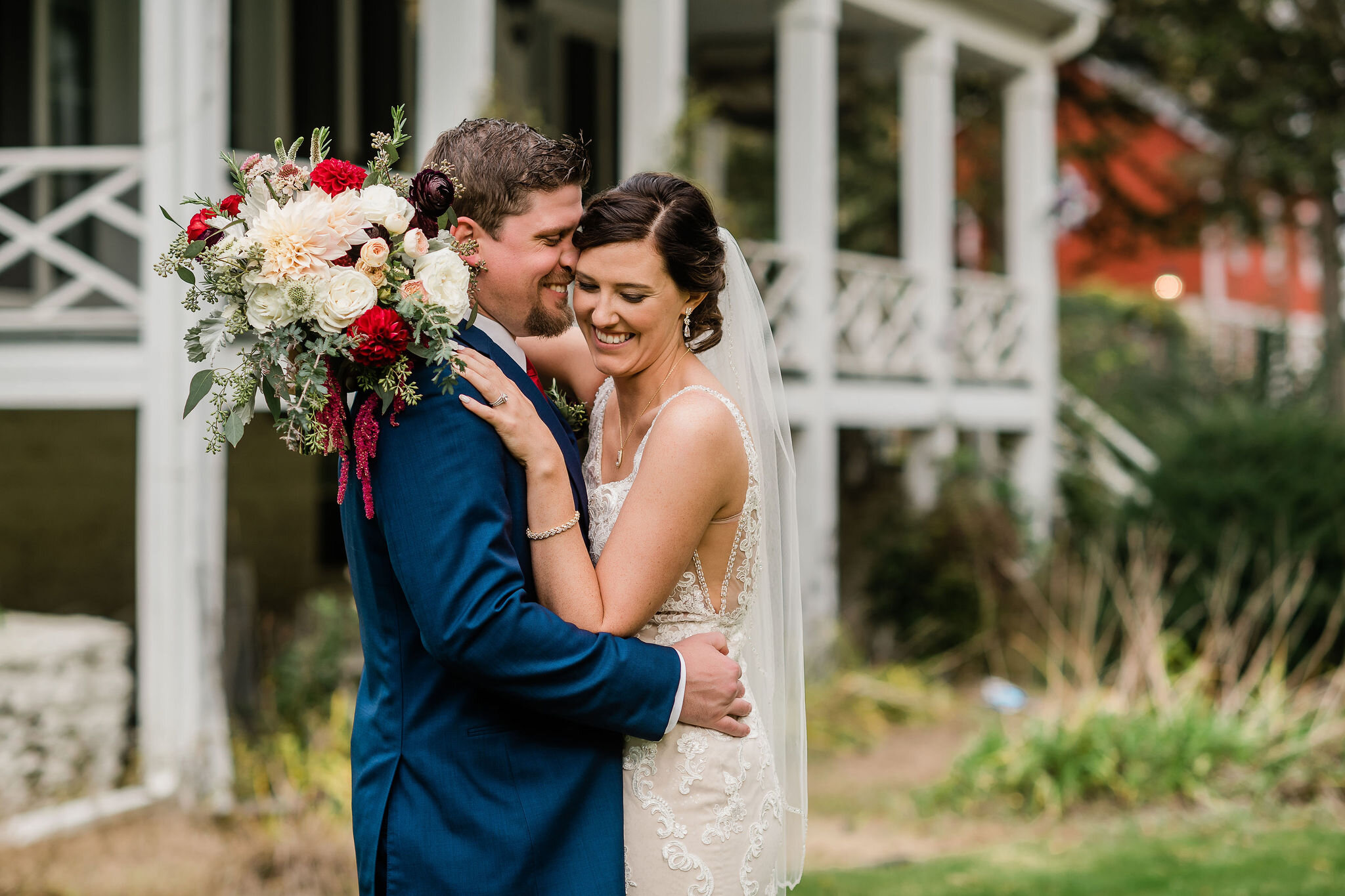 Bride laughing with groom