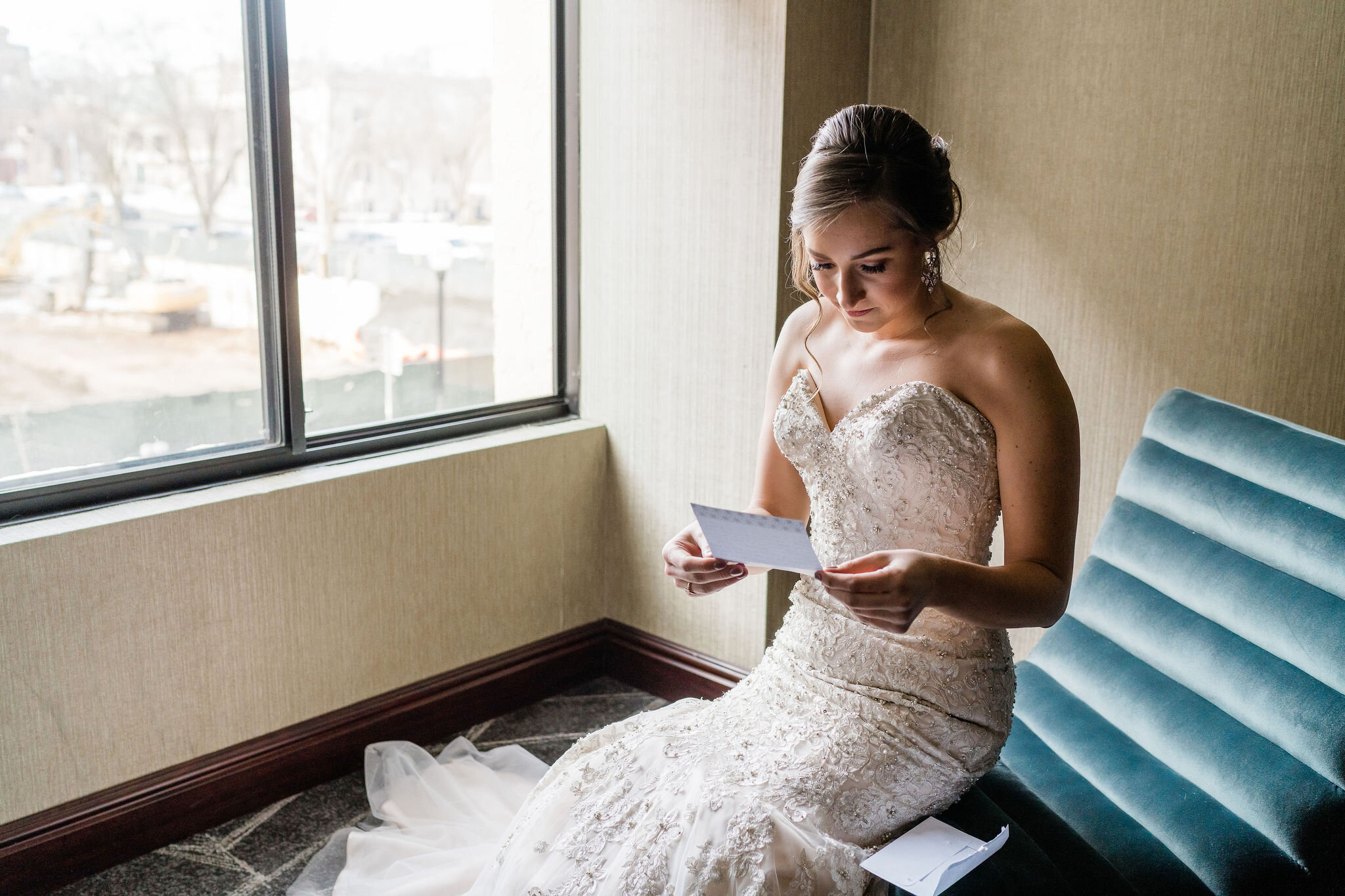 Bride reading a letter from the groom