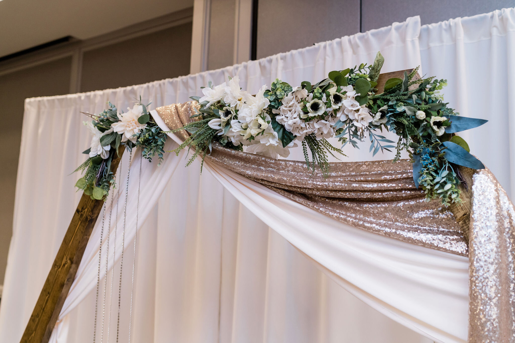 Flowers on wedding arch