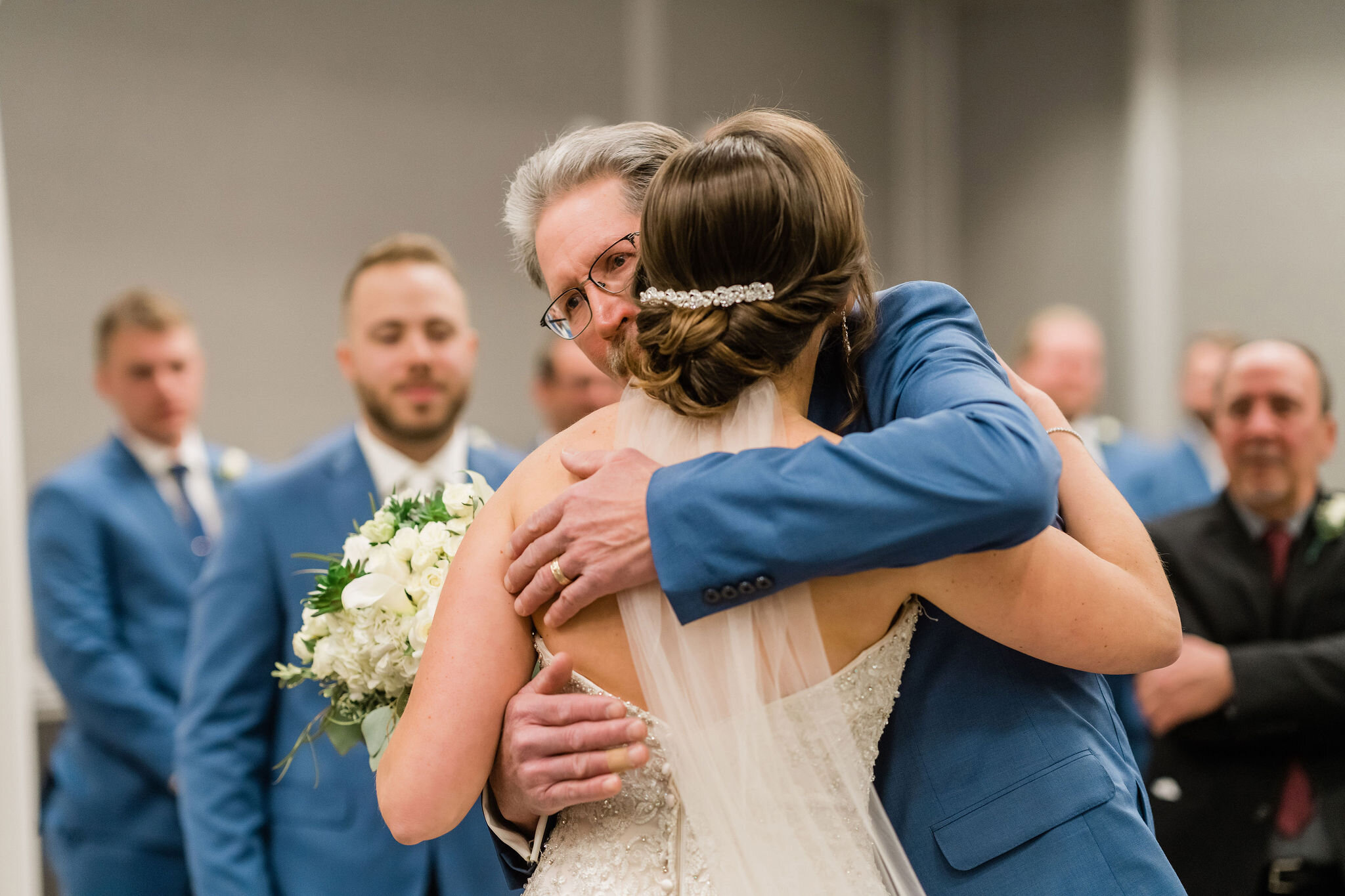 Bride hugging her dad