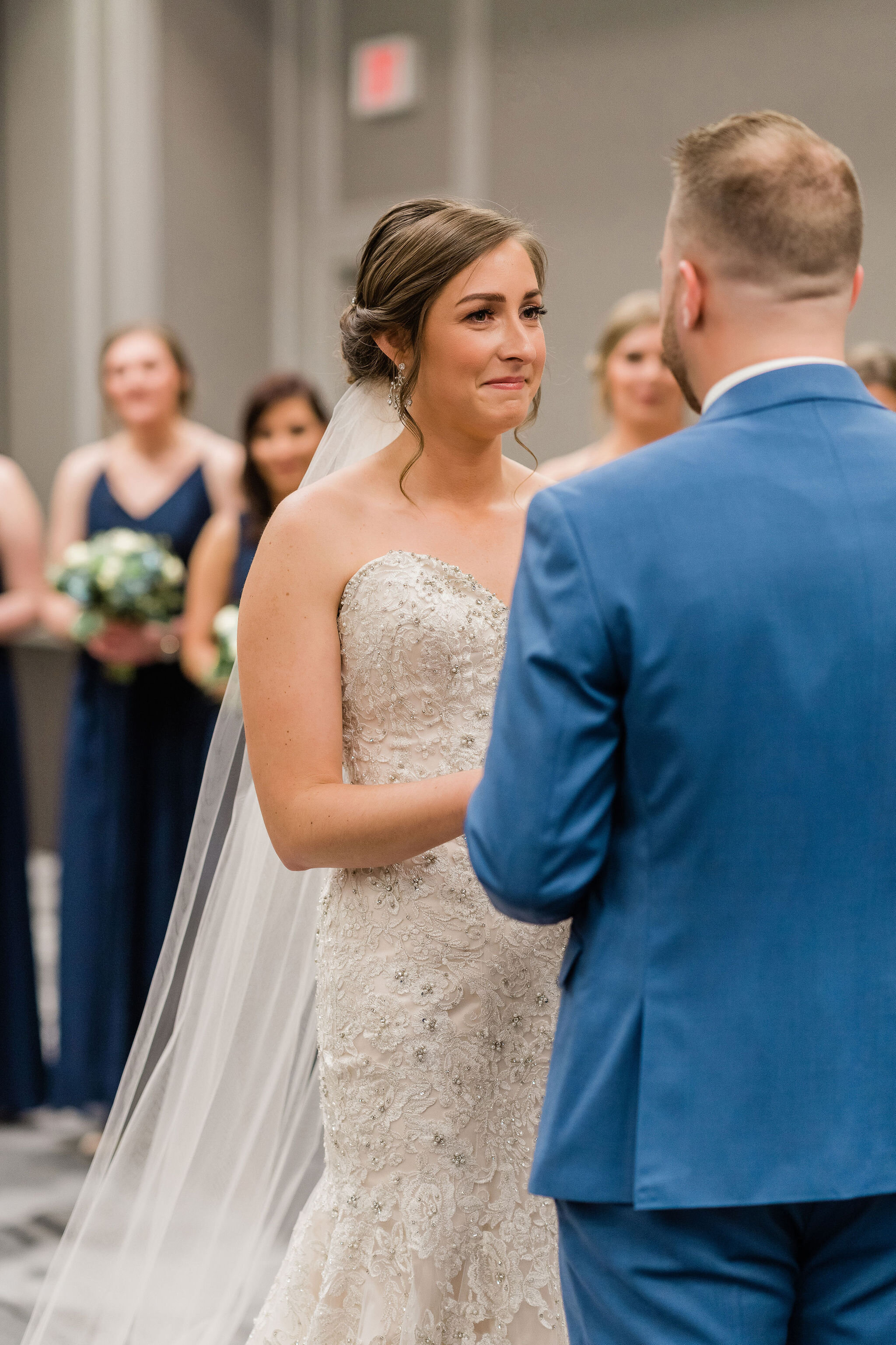 Bride smiling at groom