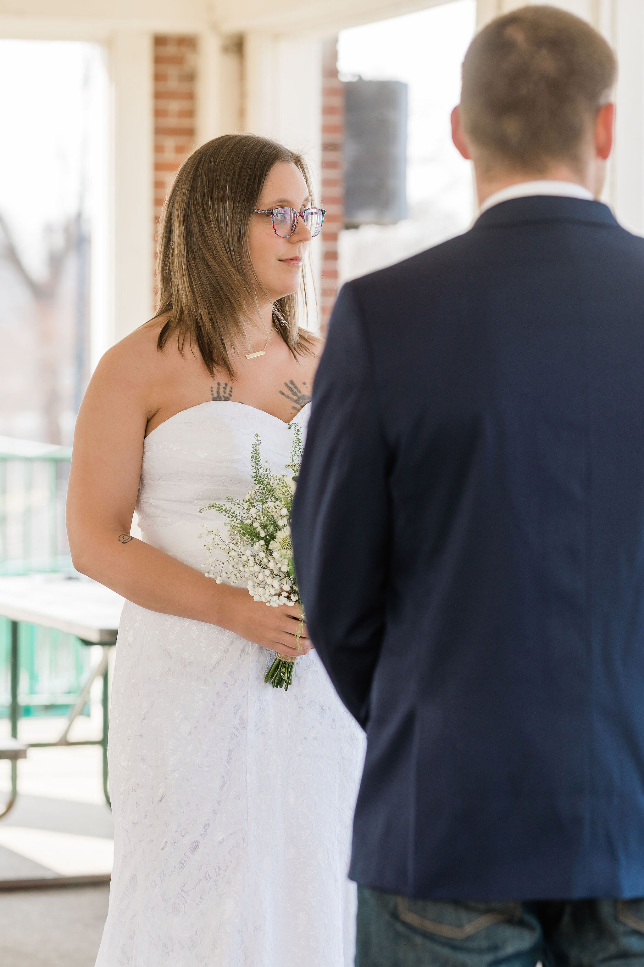 Bride looking at the officiant