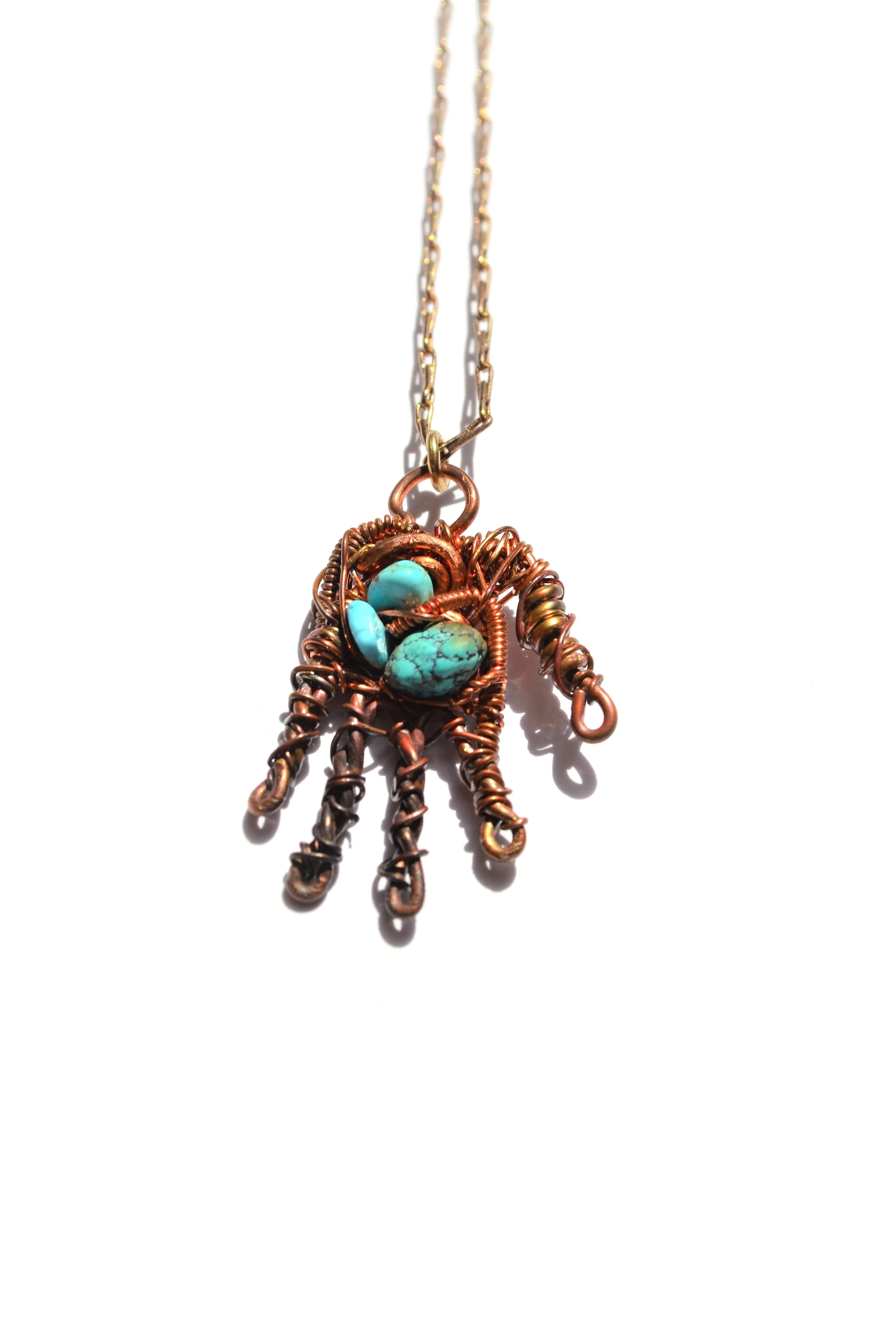 Turquoise Nest Healing Hand