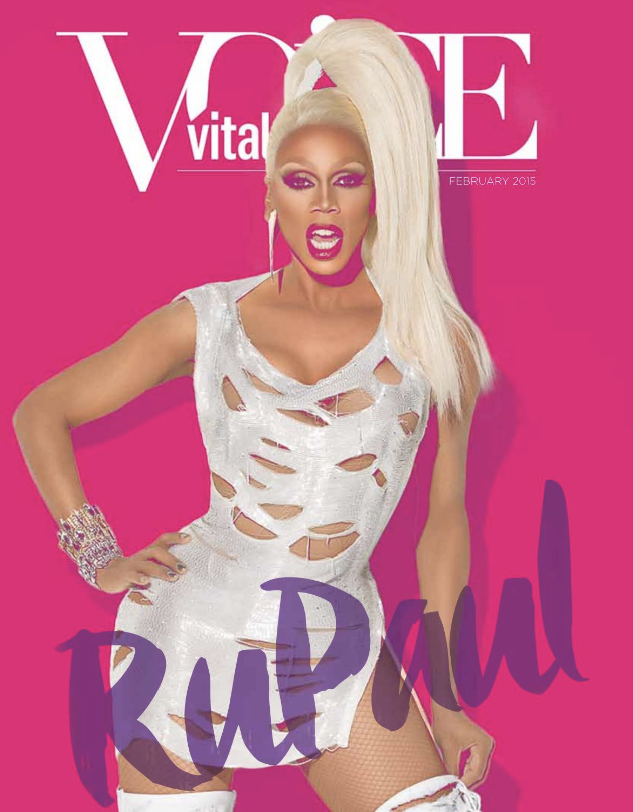 Cover of Vogue magazine, February 2015 edition, featuring a woman with platinum blonde hair styled in a tall, voluminous manner, wearing a ripped white dress, bold makeup, and jewelry, against a bright pink background.